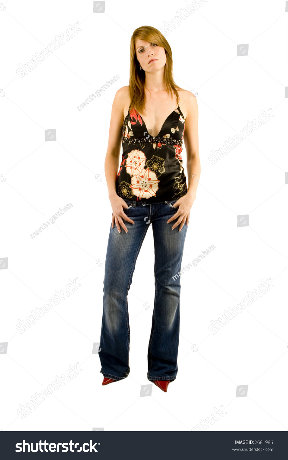 A Portrait Of A Young Woman Against A Plain Background. Stock Photo ...