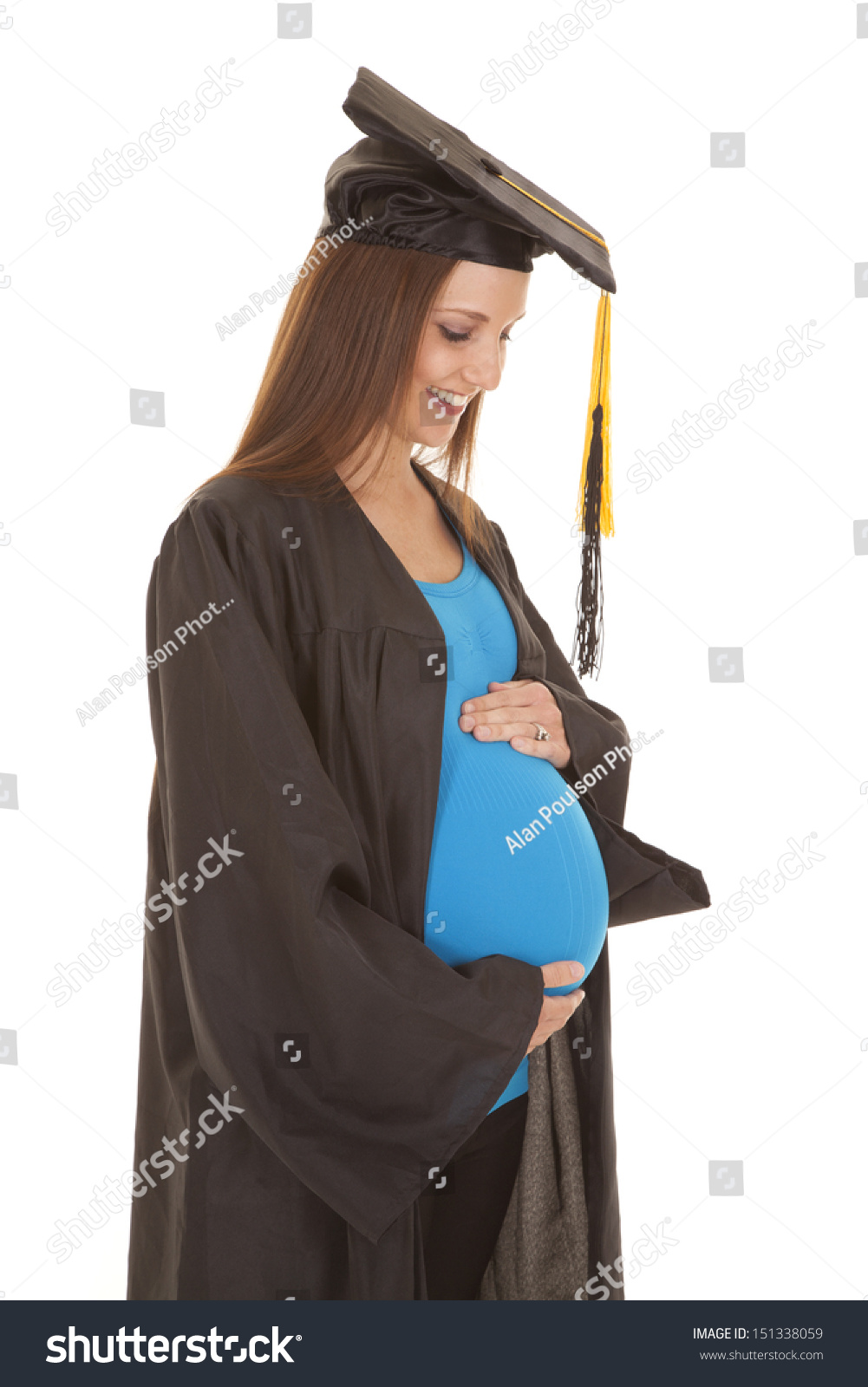 stock-photo-a-pregnant-woman-in-a-graduation-gown-holding-her-belly-151338059.jpg