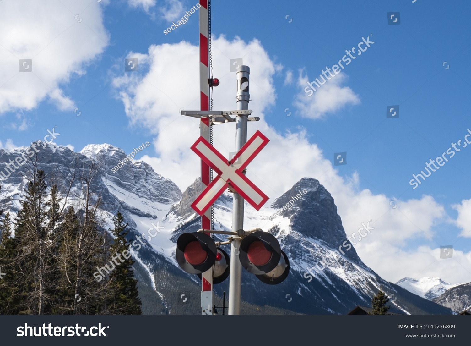 Railway Level Crossing Gate Flashing Lights Stock Photo