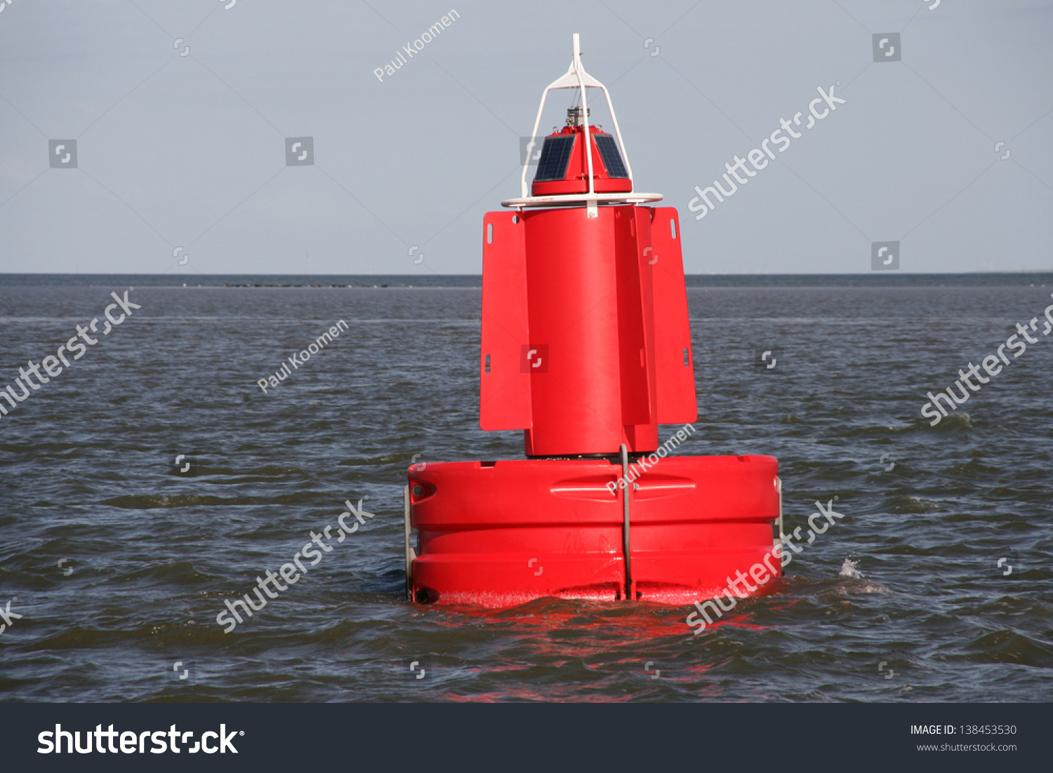 A Red Channel Marker Buoy In The Water. Stock Photo 138453530 ...