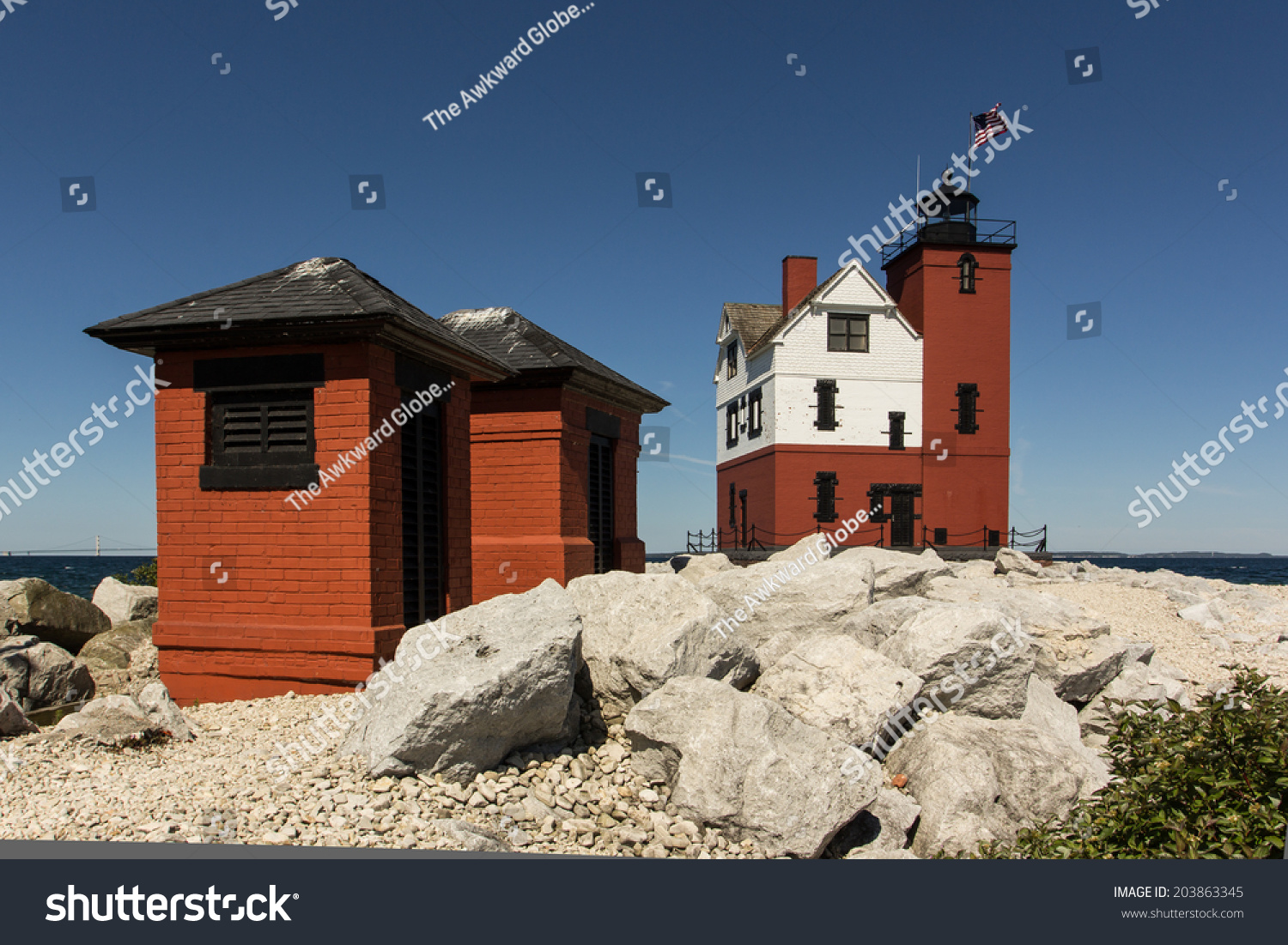 Red White Lighthouse On Rocky Beach Stock Photo Edit Now 203863345