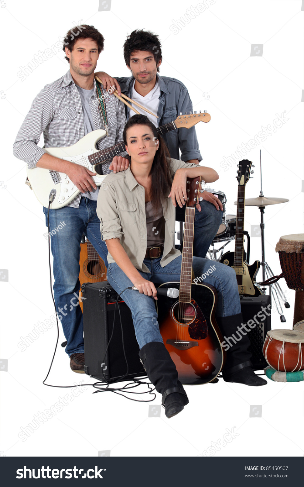 A Rock Band Posing With Their Instruments Stock Photo 85450507 ...