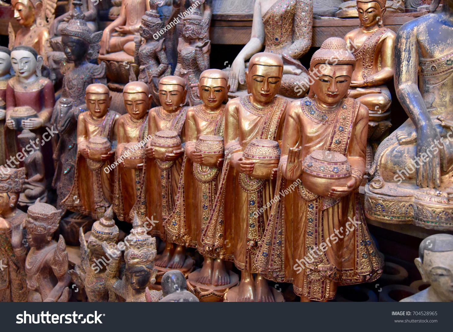 Row Wooden Buddhist Monks Statues On Stock Photo Edit Now 704528965