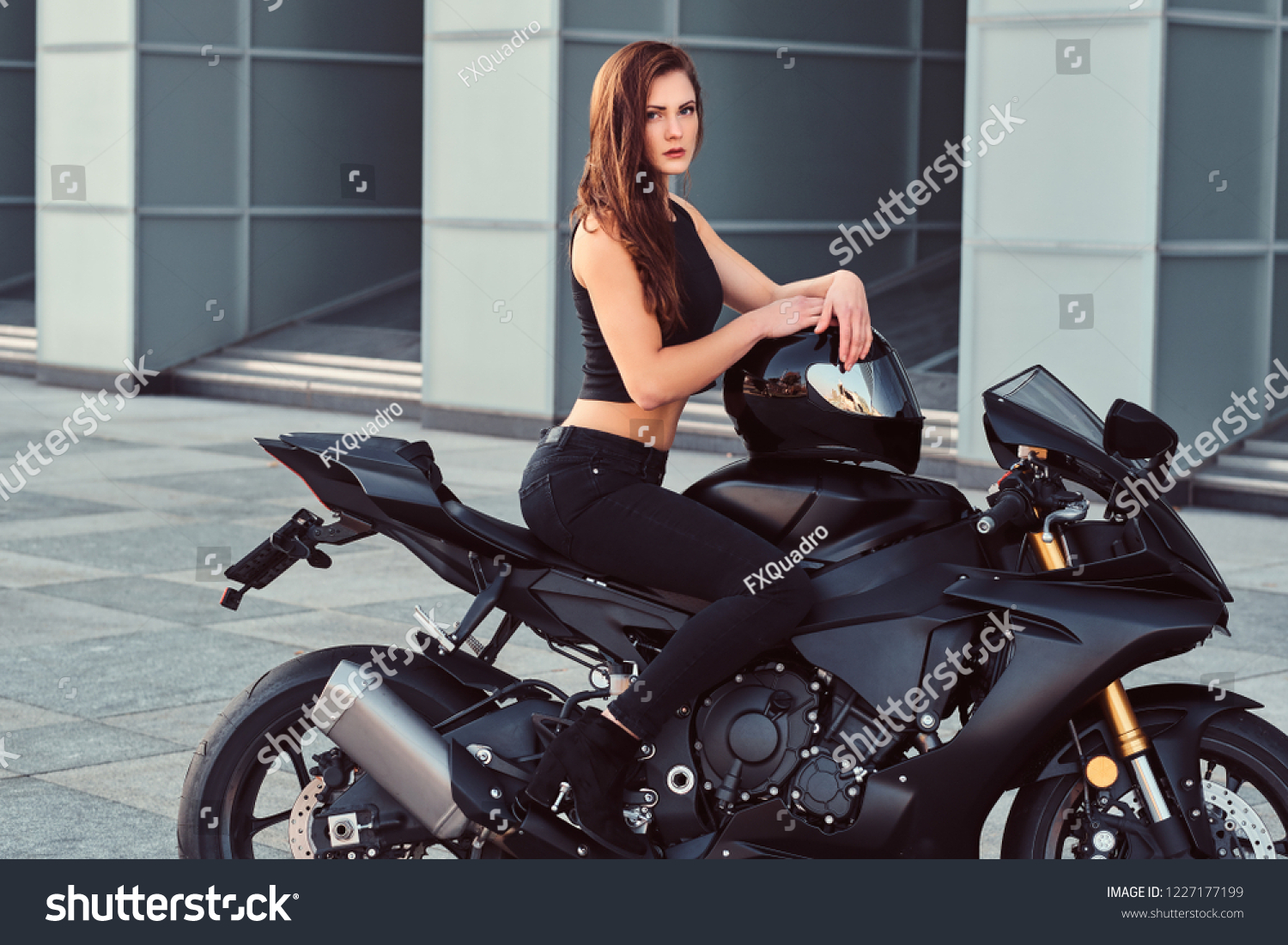 Sexy Biker Girl Sitting On Her Foto Stok 1227177199 Shutterstock