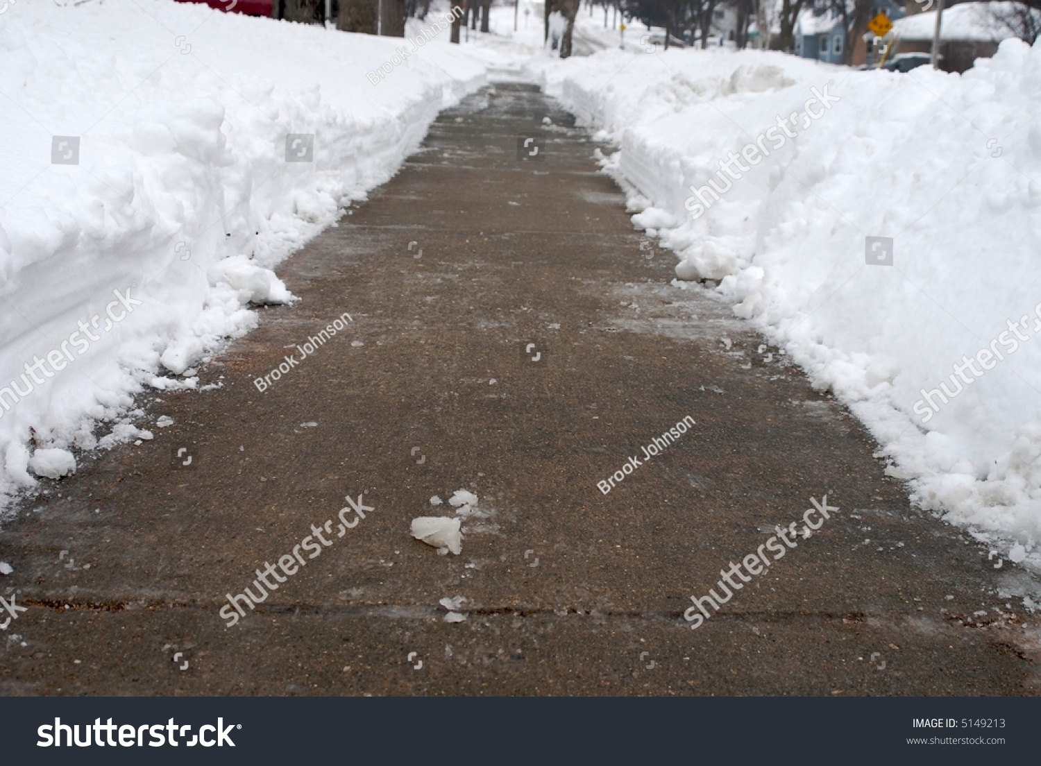 A Sidewalk Is Cleared Of Snow. Stock Photo 5149213 : Shutterstock