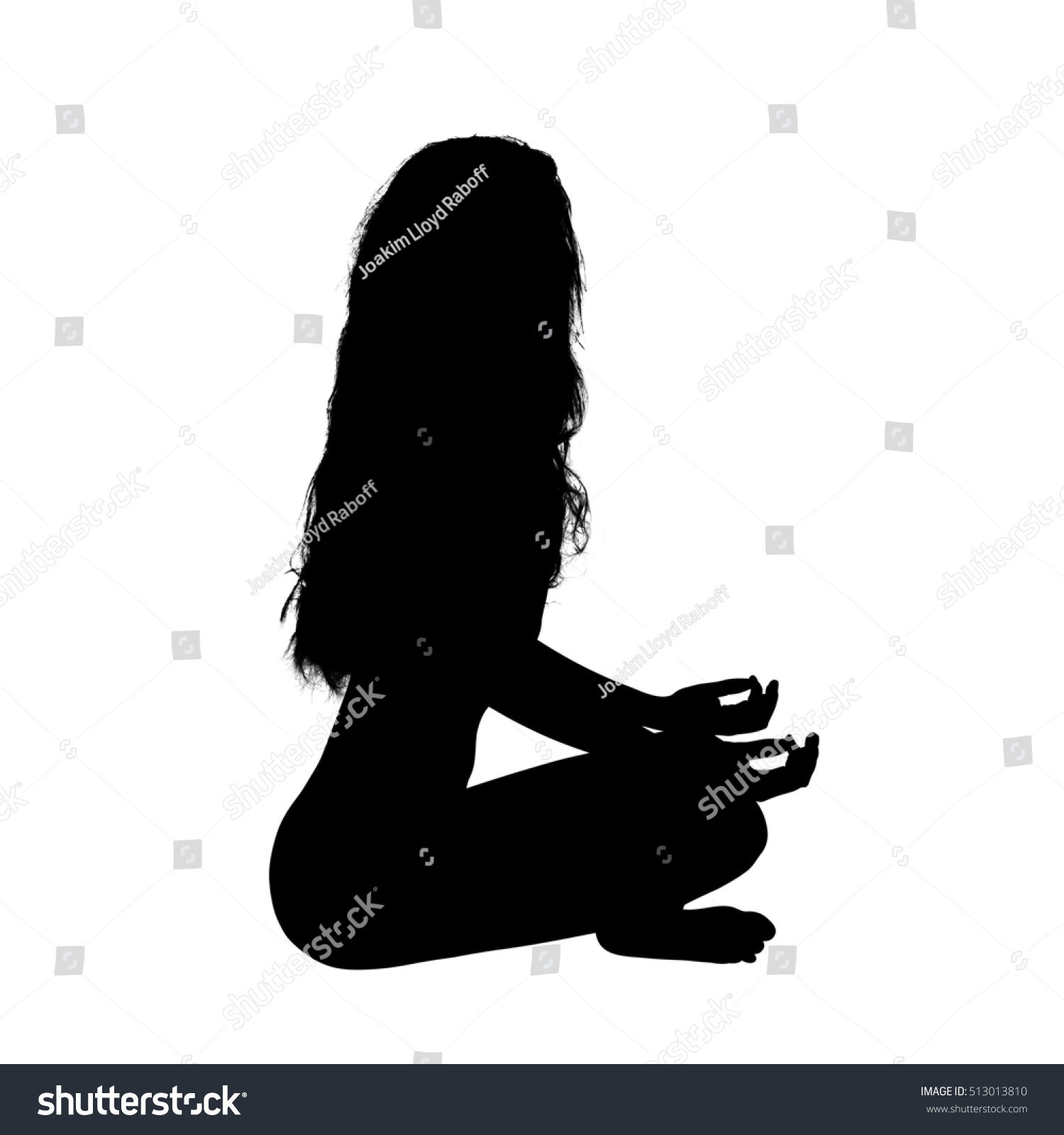 A Silhouette Of A Young Female Yoga Practitioner Sitting Sideways In A ...