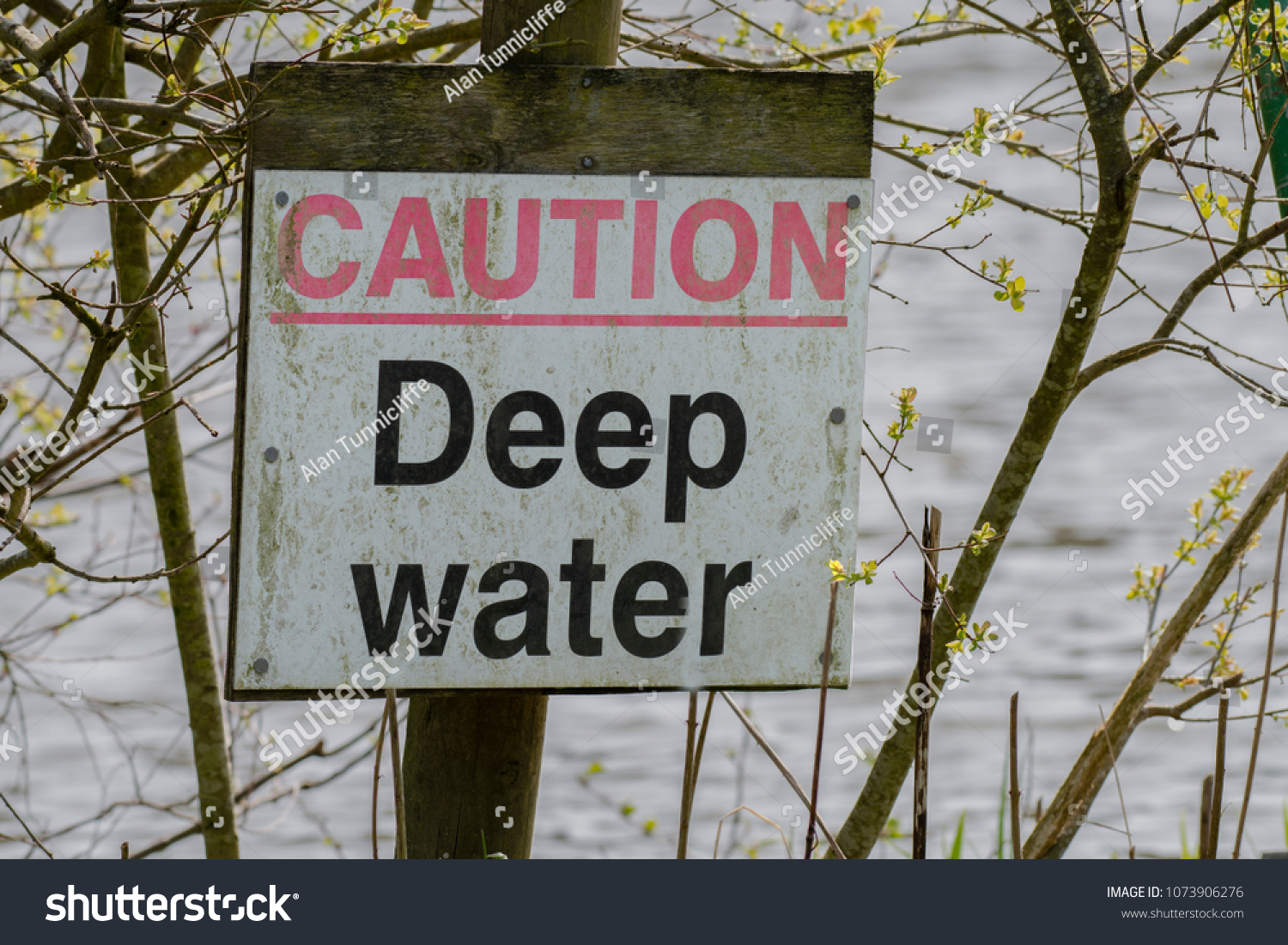 simple-caution-sign-located-by-edge-stock-photo-1073906276-shutterstock