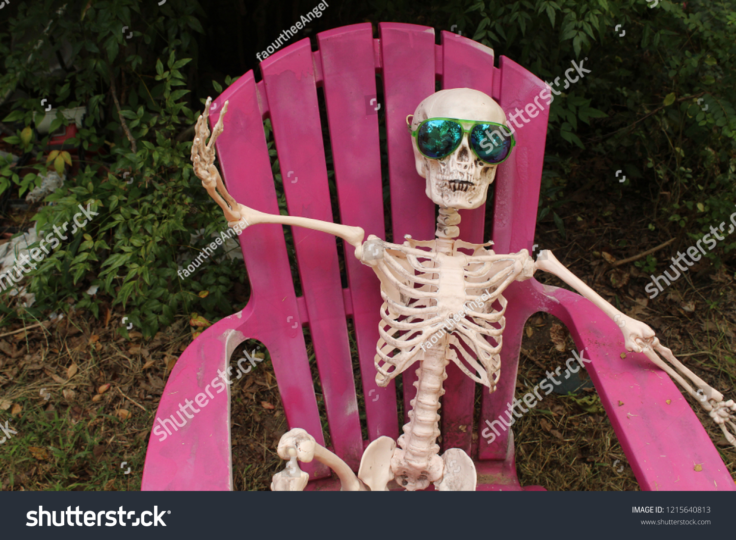 Skeleton Sunglasses Waving While Sitting Pink Holidays Stock Image
