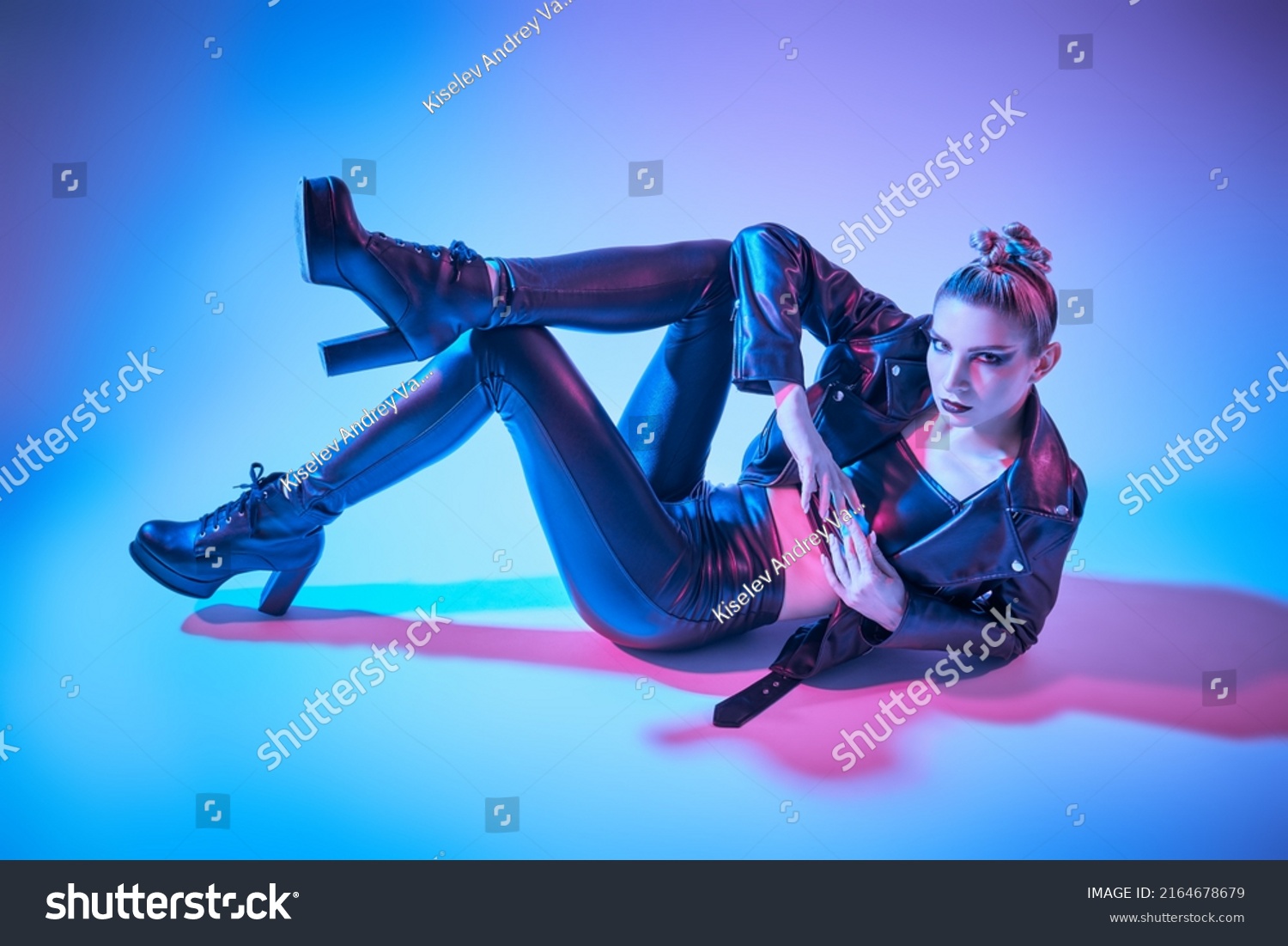 slender-girl-model-posing-expressively-on-stock-photo-2164678679