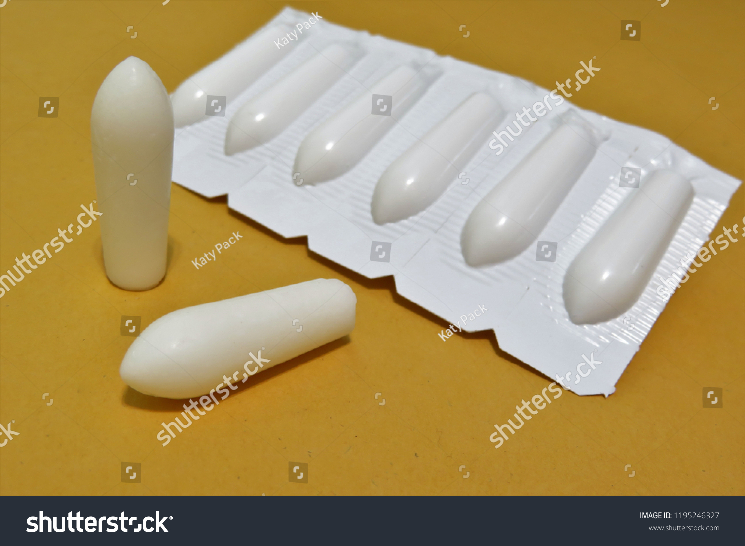 Download Strip Suppositories White Plastic Two Unwrapped Stock Photo Edit Now 1195246327 PSD Mockup Templates