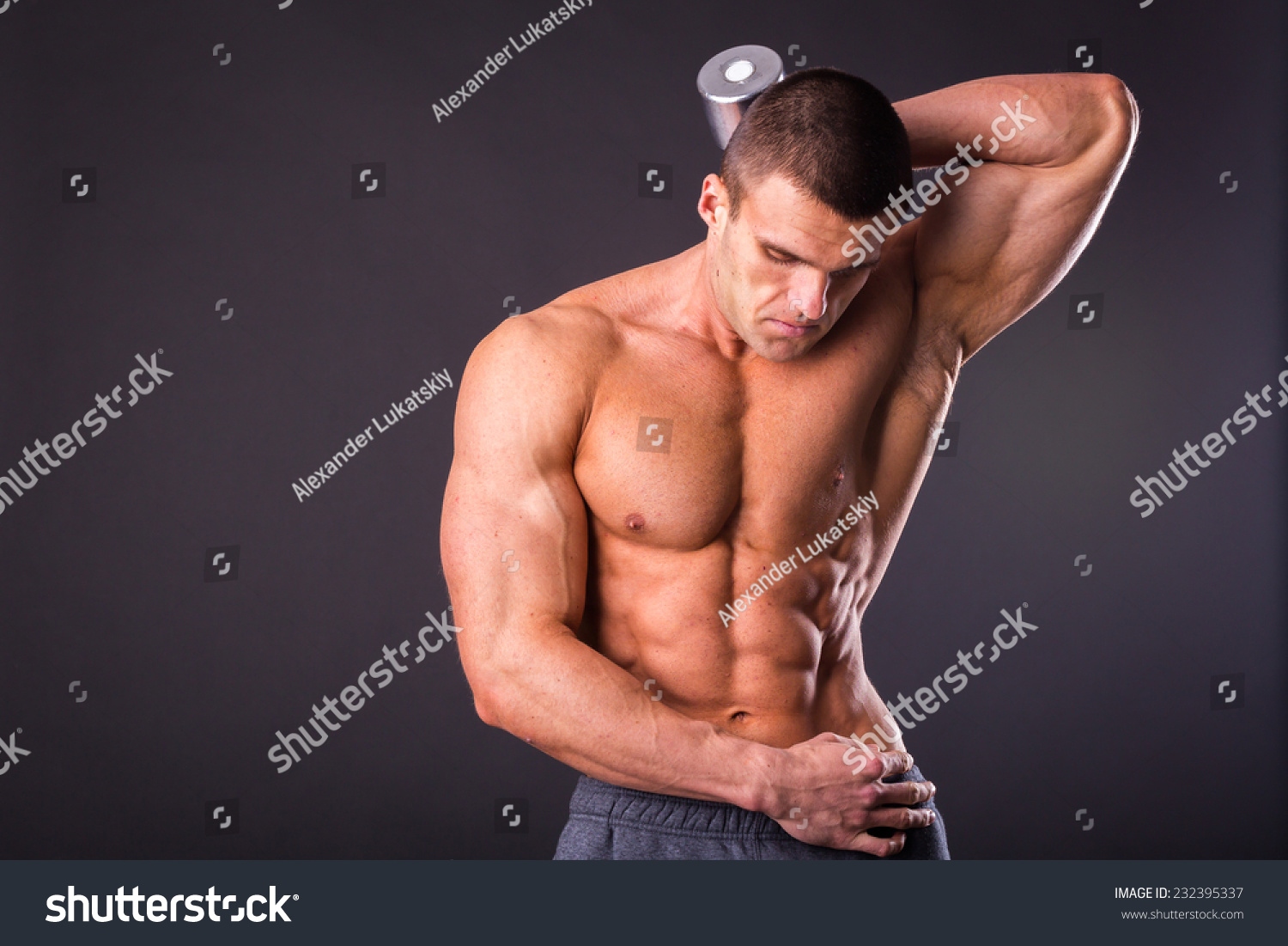 Strong Man Bodybuilder Posing On Gray Stock Photo Edit Now 232395337 Images, Photos, Reviews