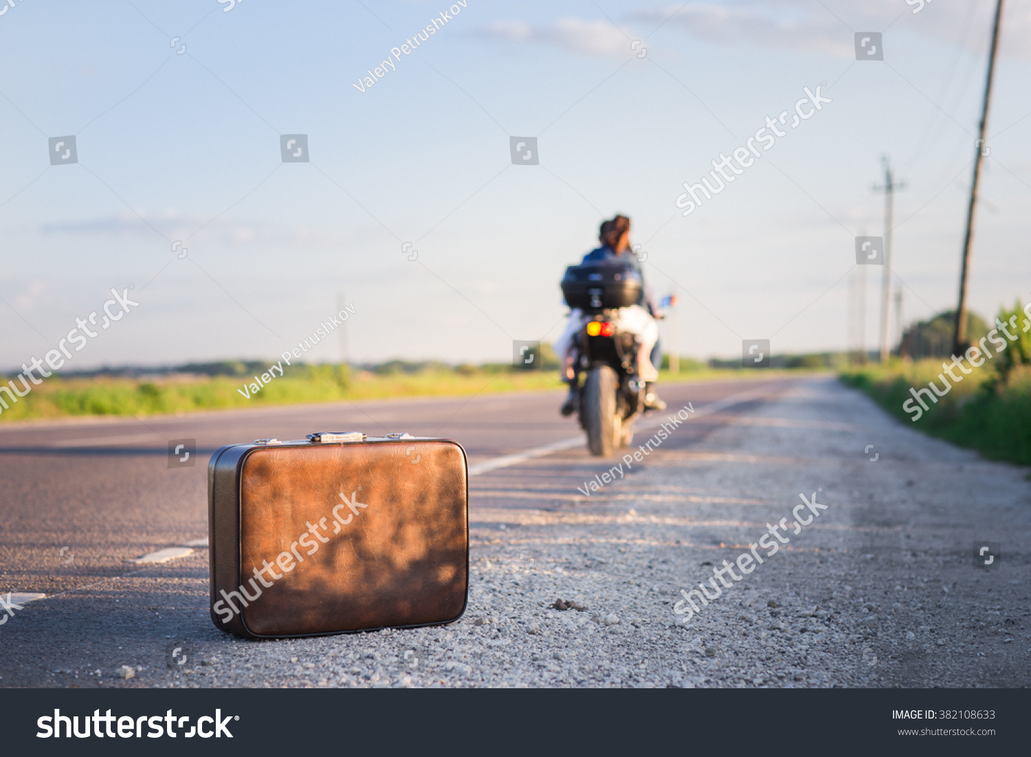 suitcase on motorcycle