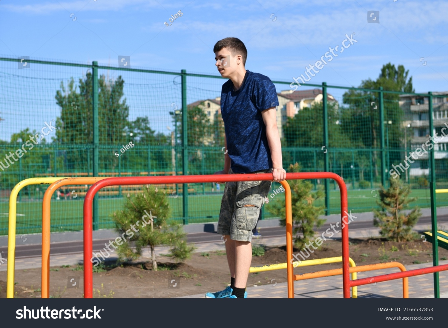 Teenage Boy Trains On Sports Ground Stock Photo 2166537853 | Shutterstock