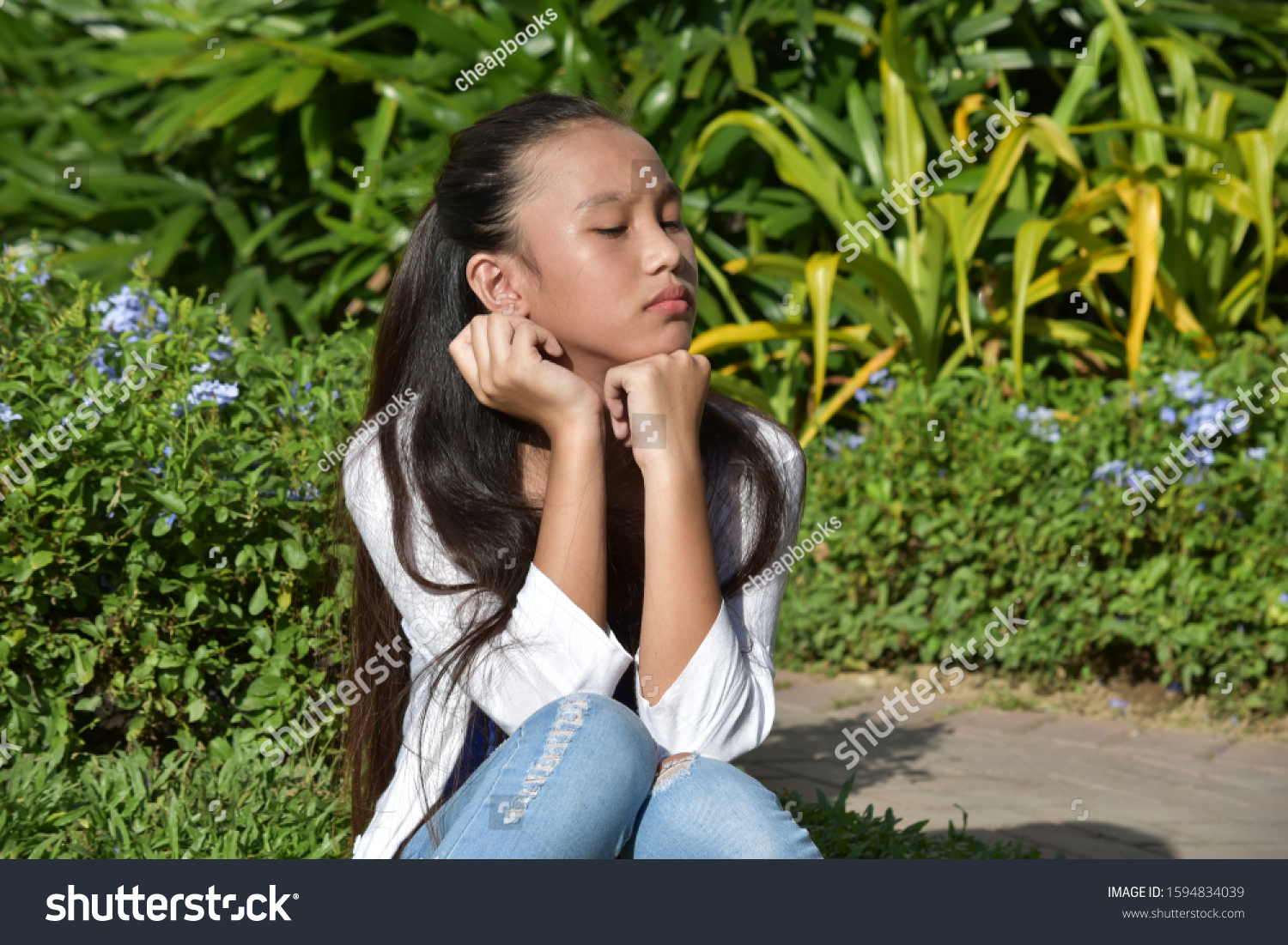 Thoughtful Filipina Teen Girl Stock Photo Edit Now