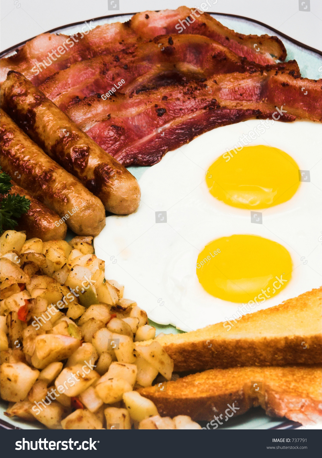 Traditional American Breakfast Eggs Bacon Sausage Stock Photo