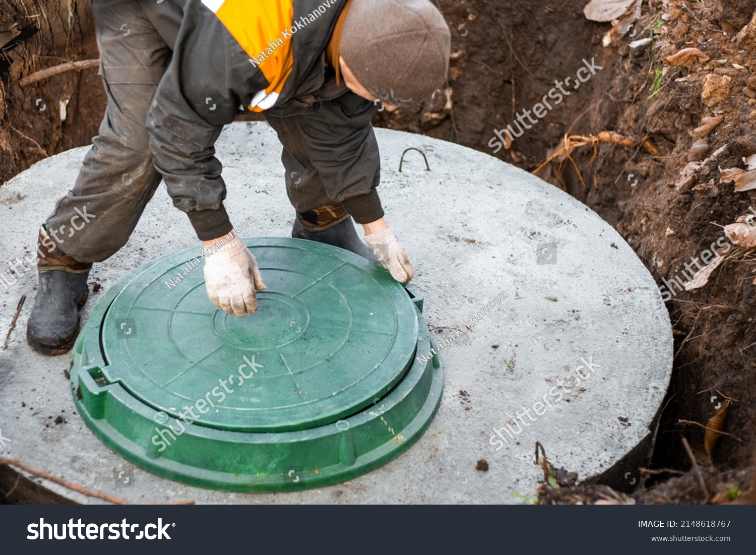 Utility Worker Lifts Manhole Cover Sewerage Stock Photo 2148618767 ...