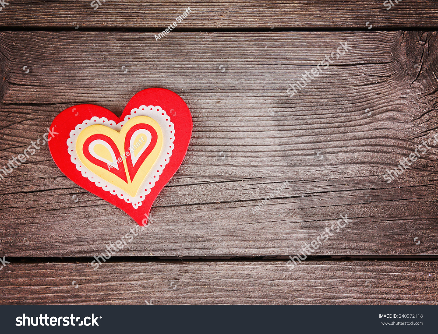 A Valentine'S Day Heart On A Wooden Background Stock Photo 240972118