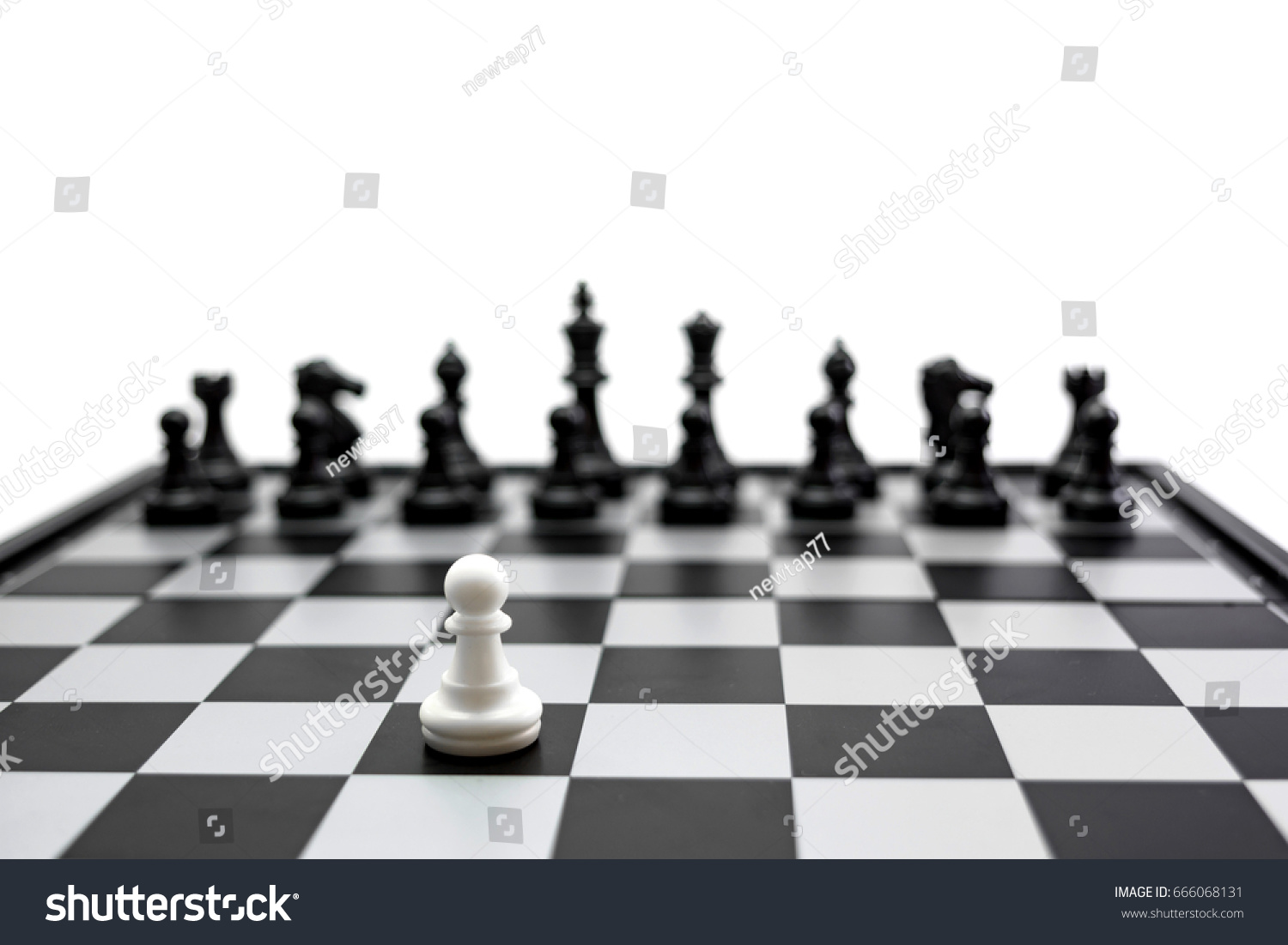 White Pawn Versus Black King Queen Royalty Free Stock Image