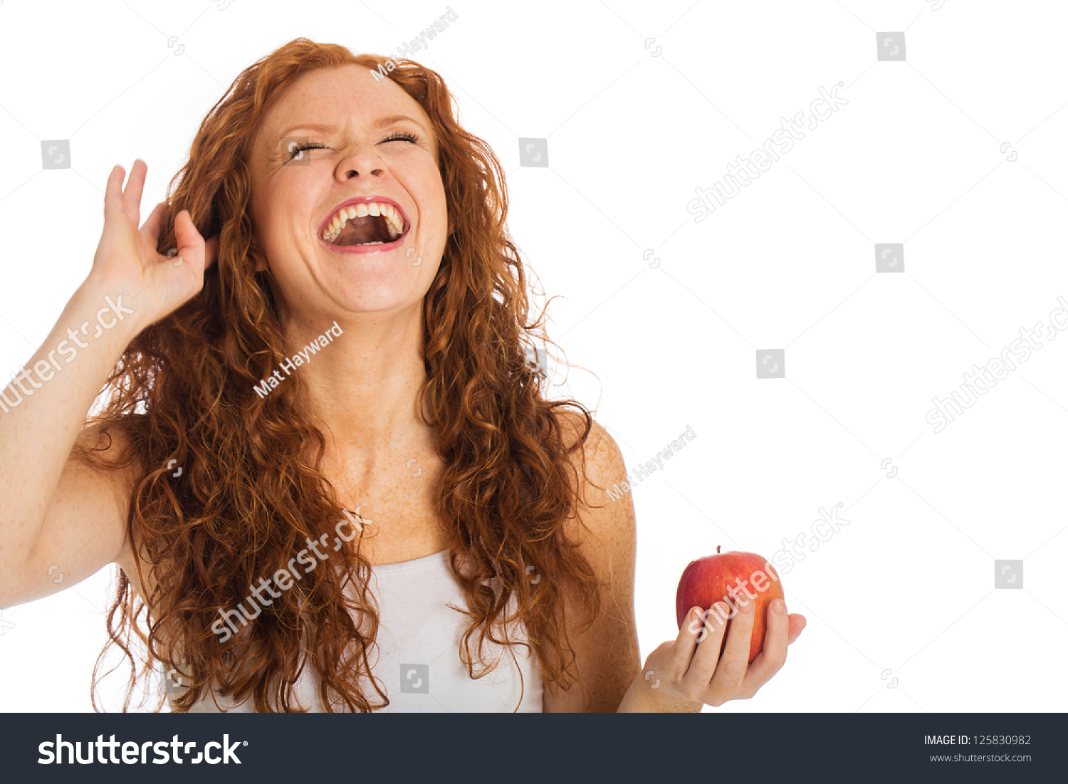 Woman Laughing Hysterically While Holding Fresh Stock 