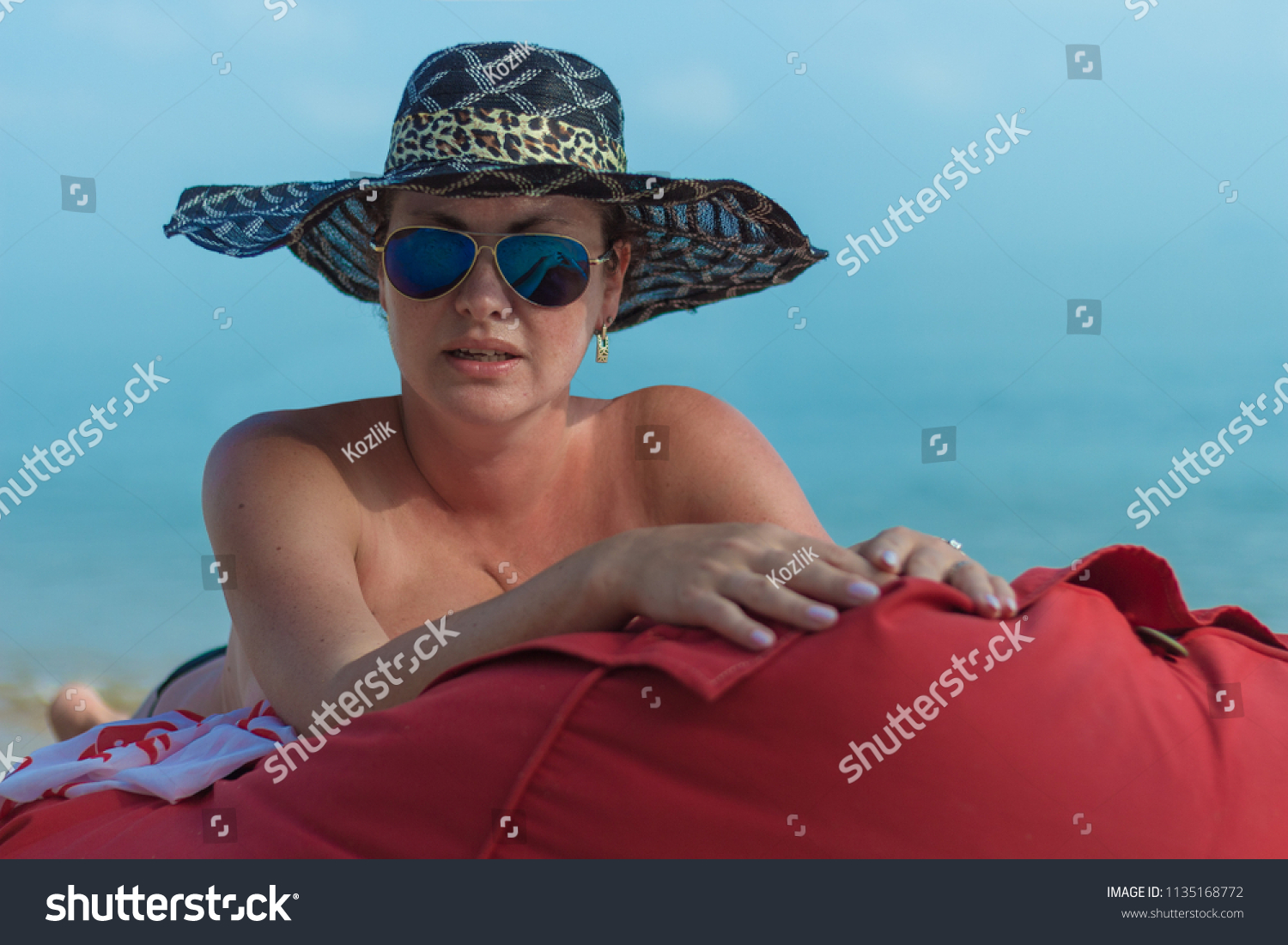 Black woman nude beach pics Woman Nude Black Hat Sunglasses Lies Stock Photo Edit Now 1135168772
