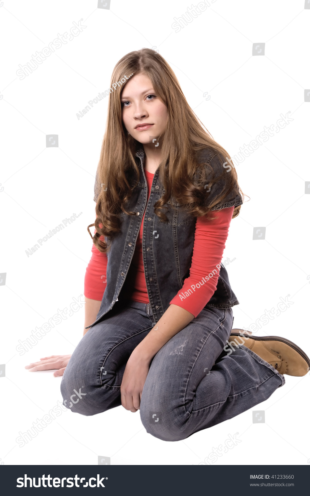 A Woman Sitting With A Sad And Serious Look On Her Face. Stock Photo ...