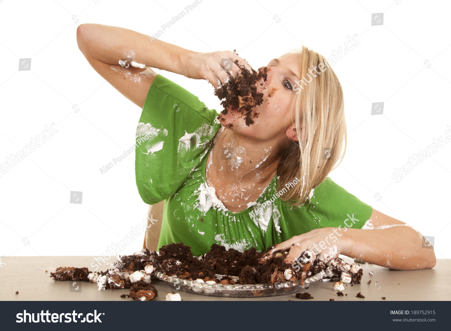 Girl Eating Birthday Cake With Icing On Her Face Stock ...