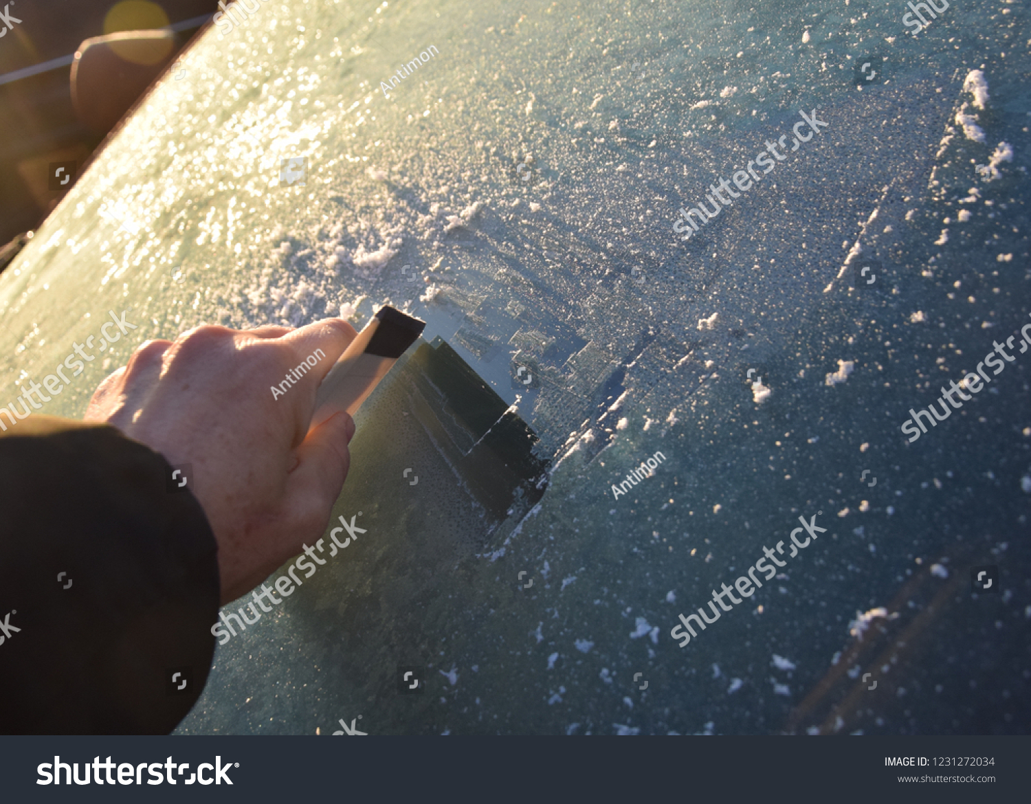 car windscreen ice scraper