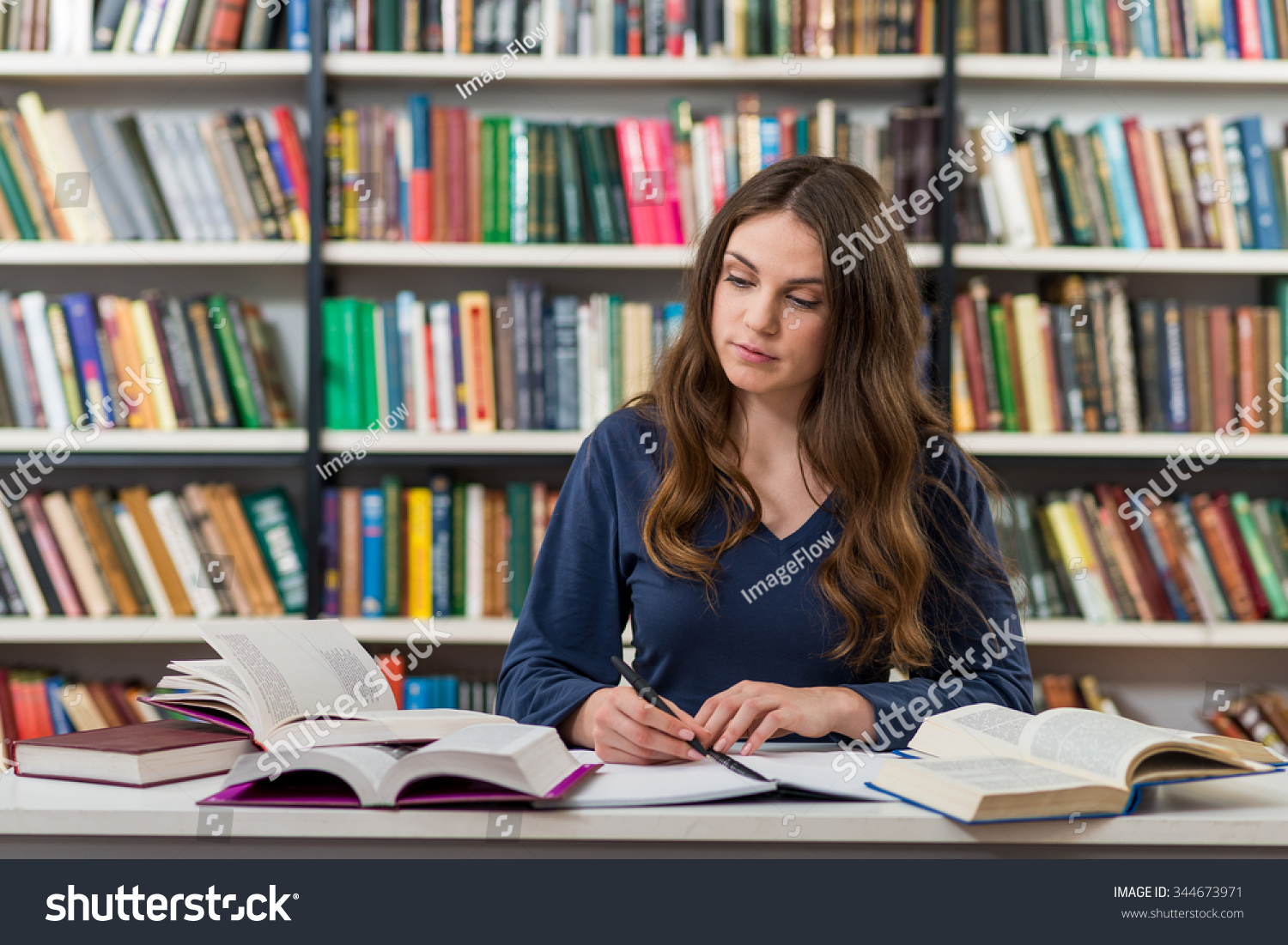 Young Brunette Girl Who Sitting Desk Stock Photo 344673971 | Shutterstock