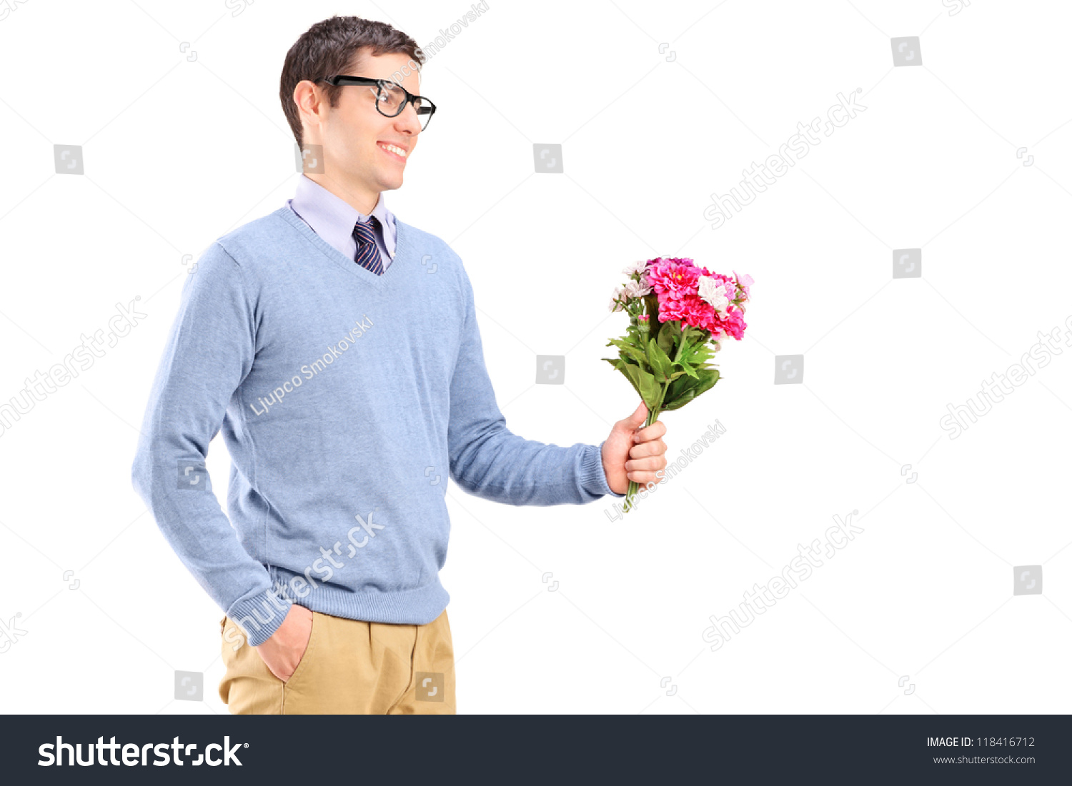 Young Man Holding Flowers Isolated On Stock Photo 118416712 - Shutterstock