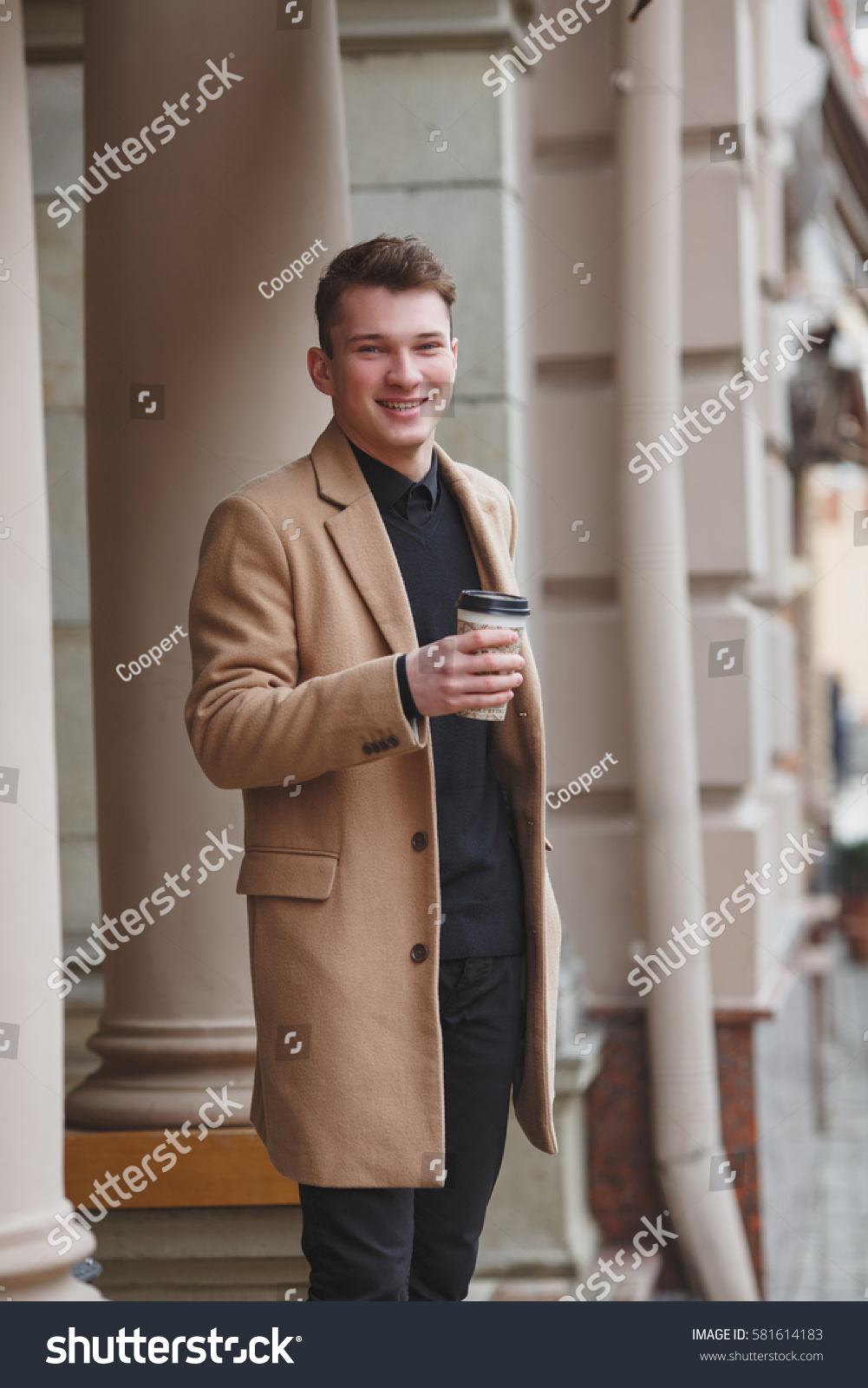 black shirt and brown pants