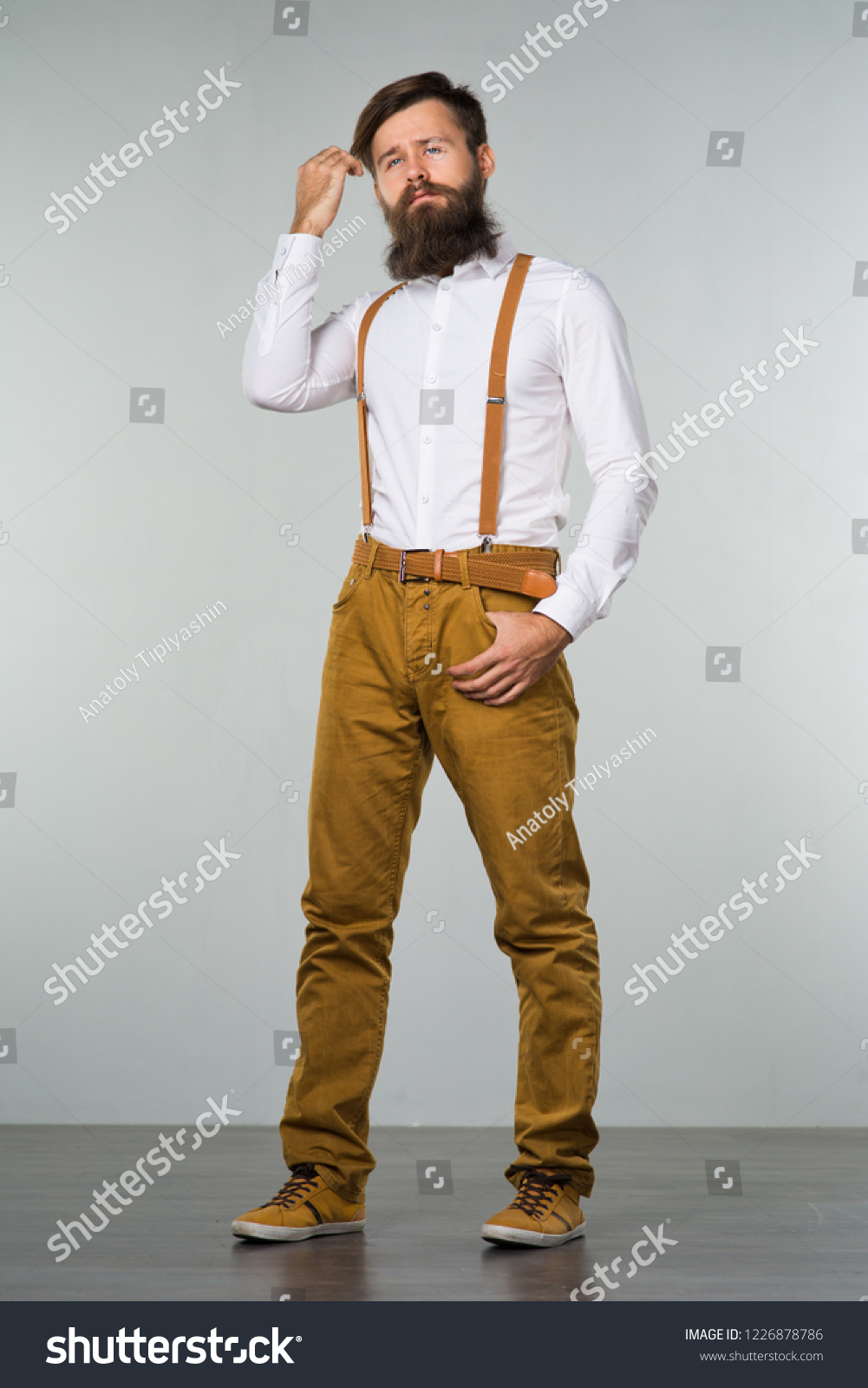 yellow pants and white shirt