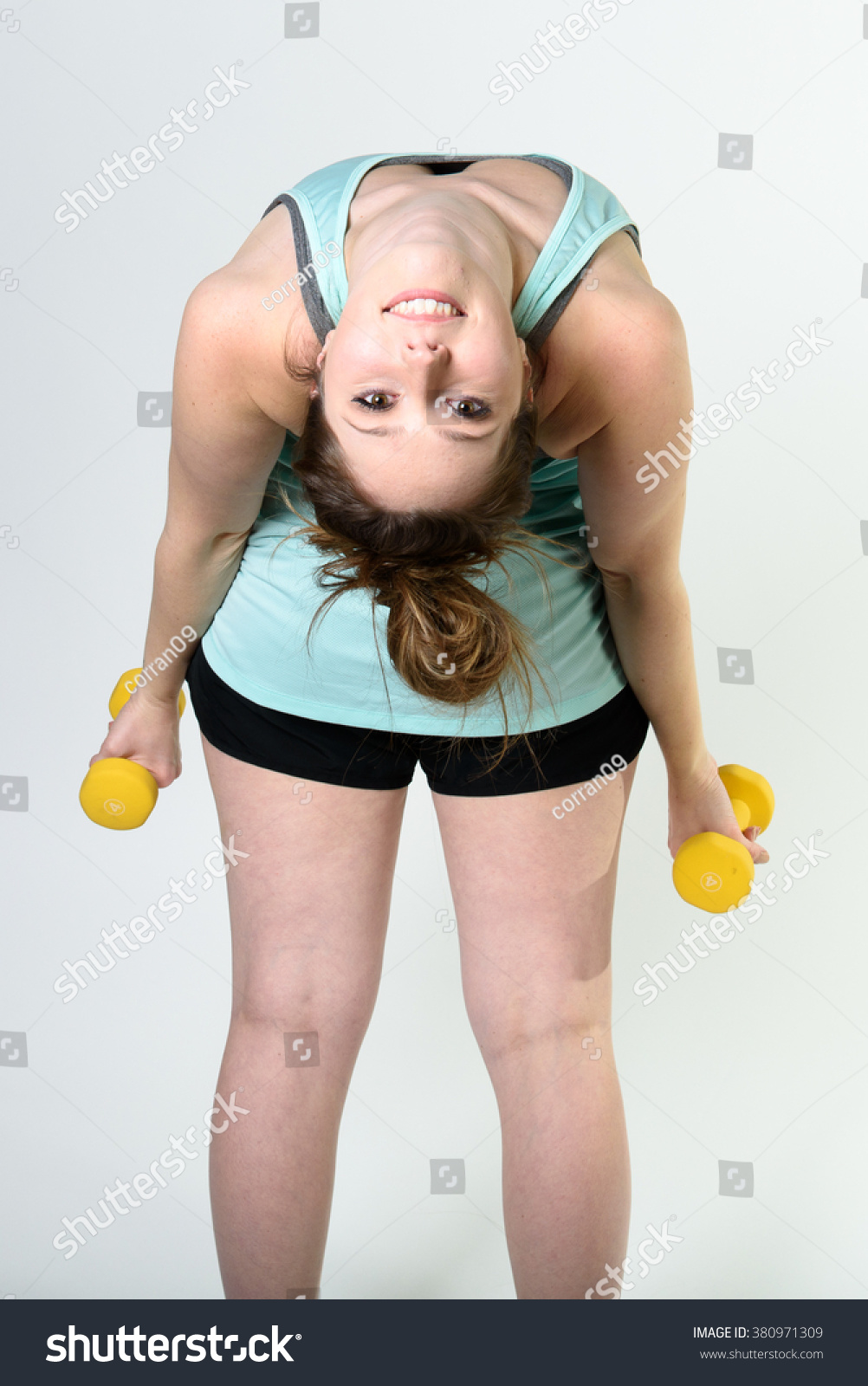 Young Woman Bending Over Backwards Smiling Stockfoto Jetzt Bearbeiten 380971309 9608