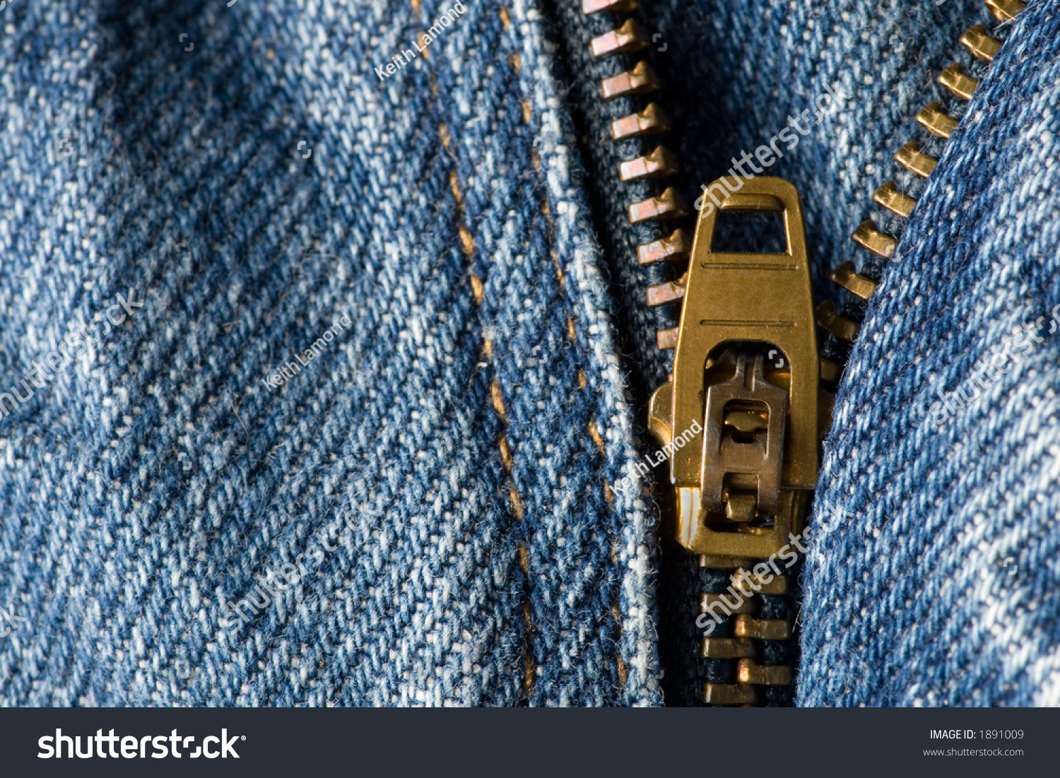 A Zipper On A Pair Of Denim Blue Jeans Partially Open Stock Photo ...