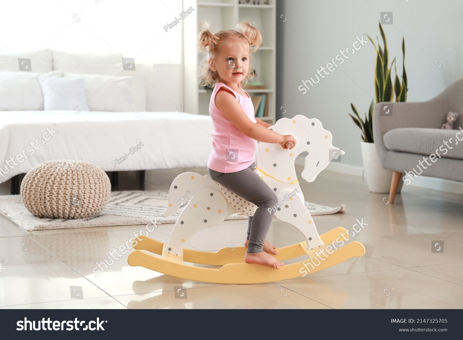 Adorable Baby Girl Rocking Horse Home Stock Photo 2147325705 Shutterstock   Stock Photo Adorable Baby Girl With Rocking Horse At Home 2147325705 