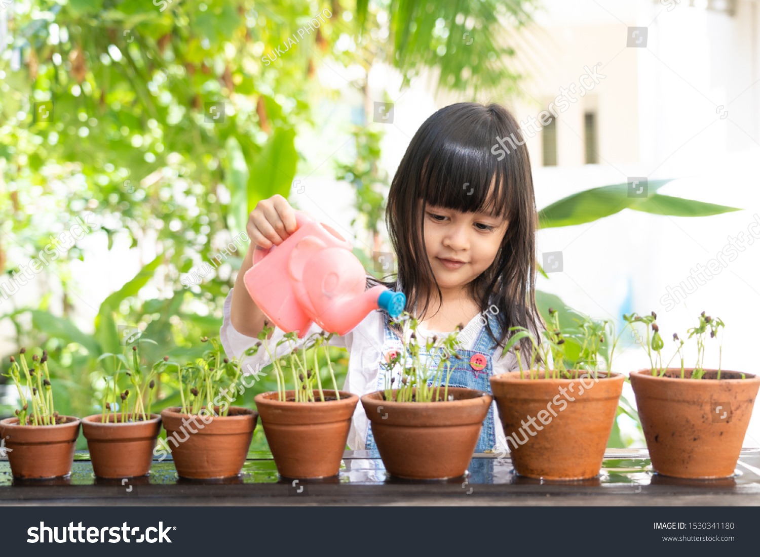 157,779 Kids planting plants Stock Photos, Images & Photography ...