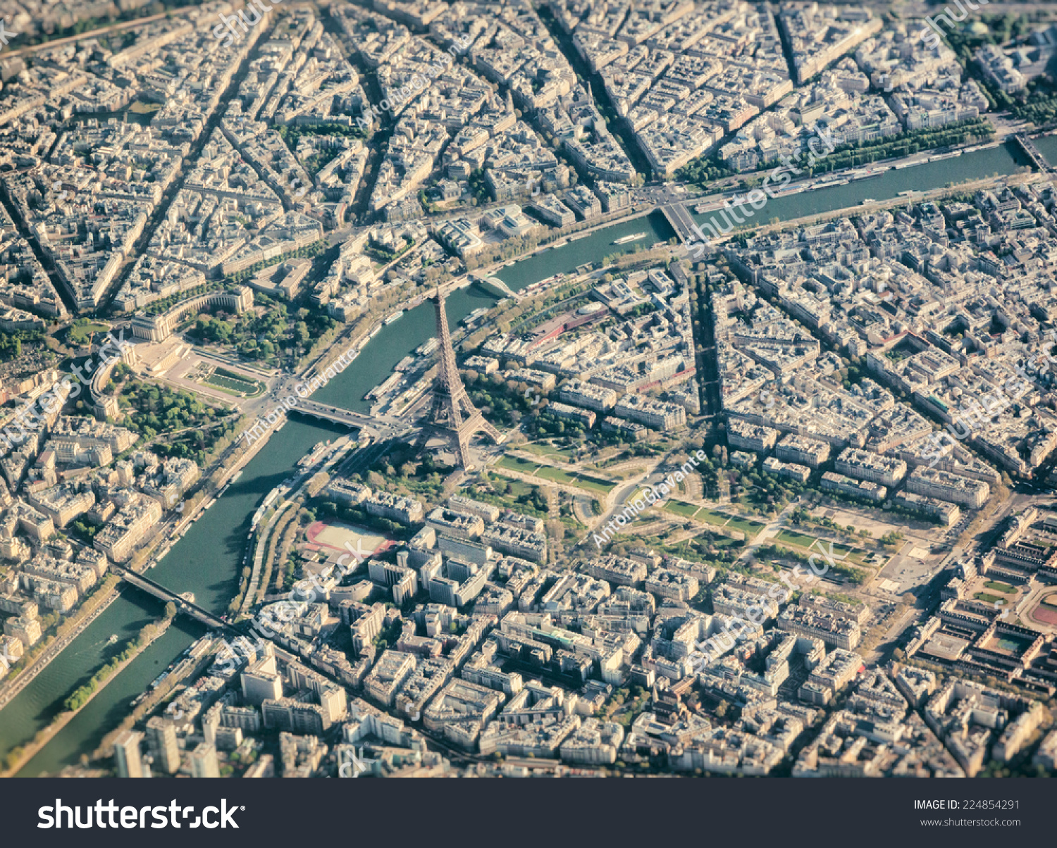 https://image.shutterstock.com/z/stock-photo-aerial-view-from-airplane-of-paris-with-eiffel-tower-224854291.jpg