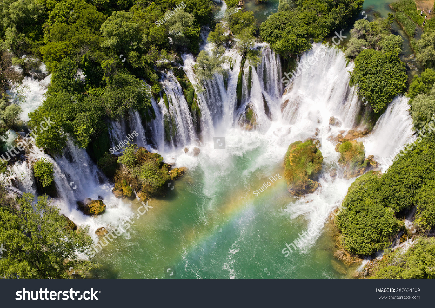  Aerial  View  Of Waterfall  With Rainbow Stock Photo 