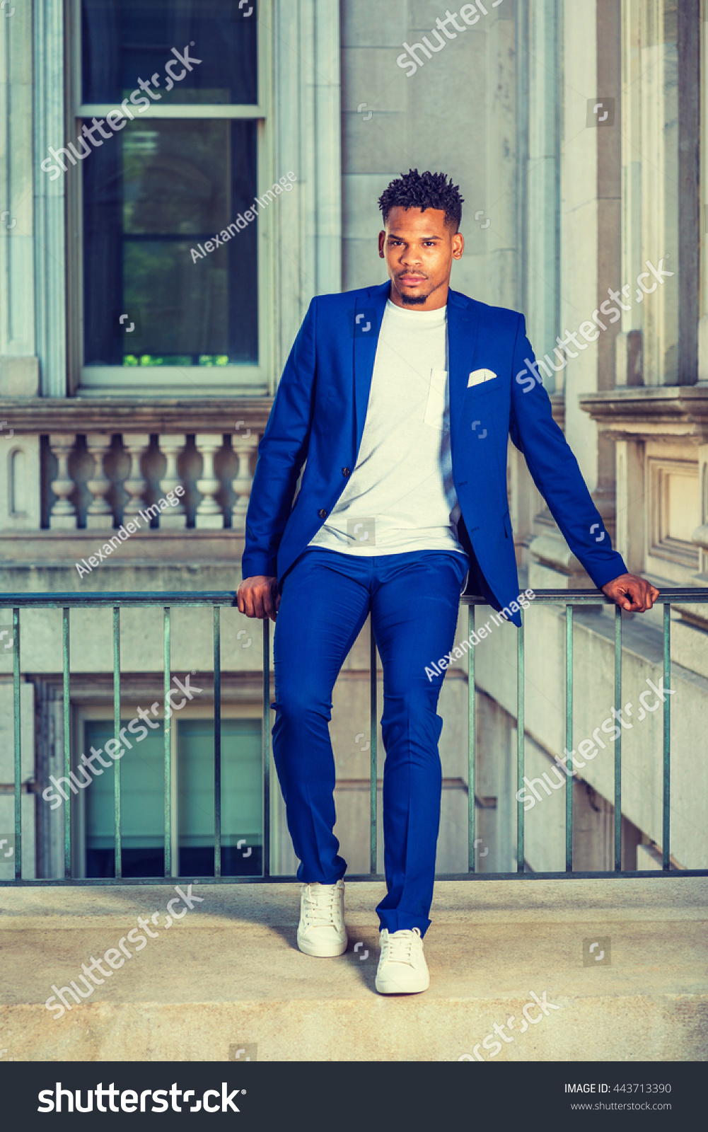blue suit with sneakers