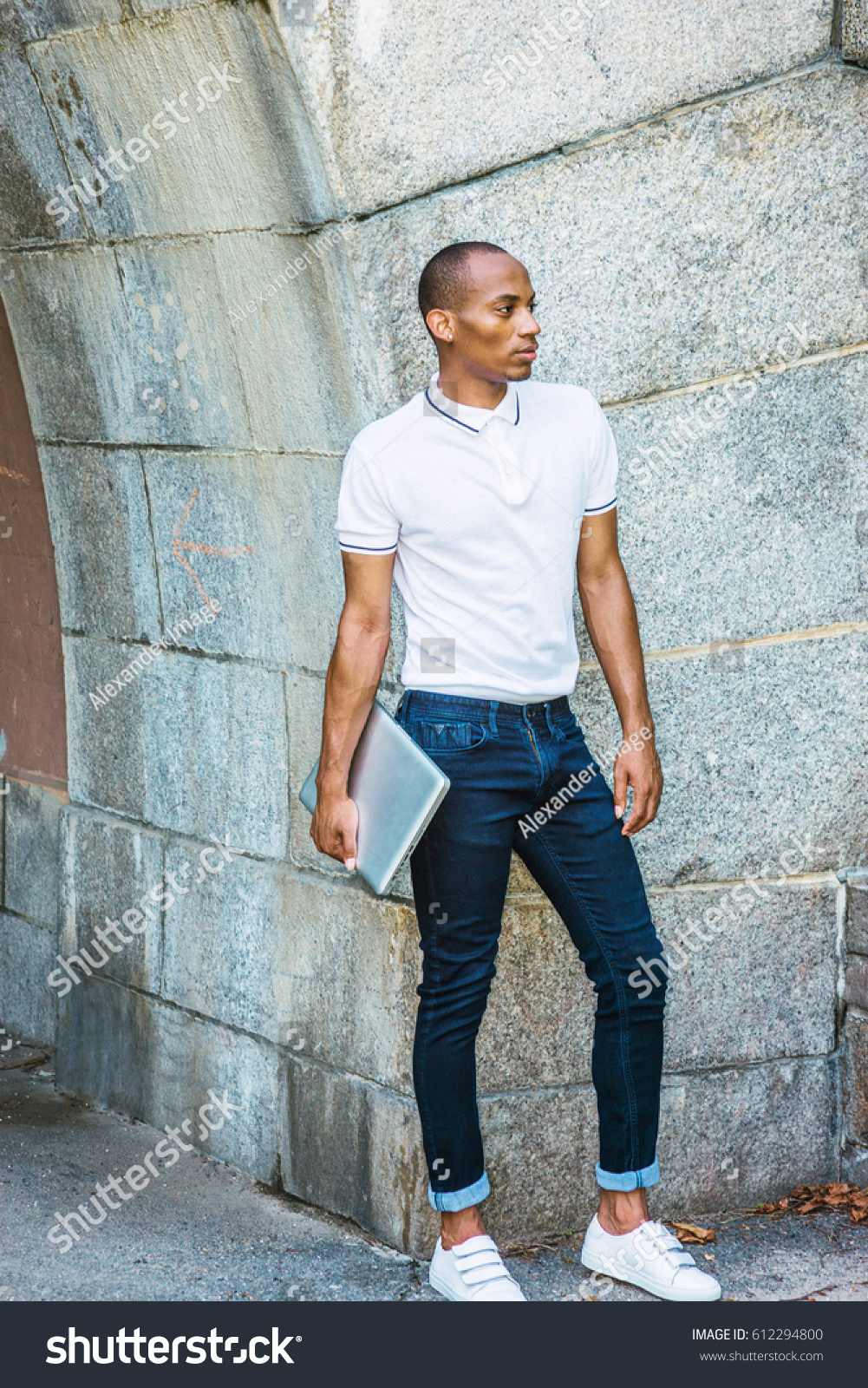 white polo shirt and blue jeans