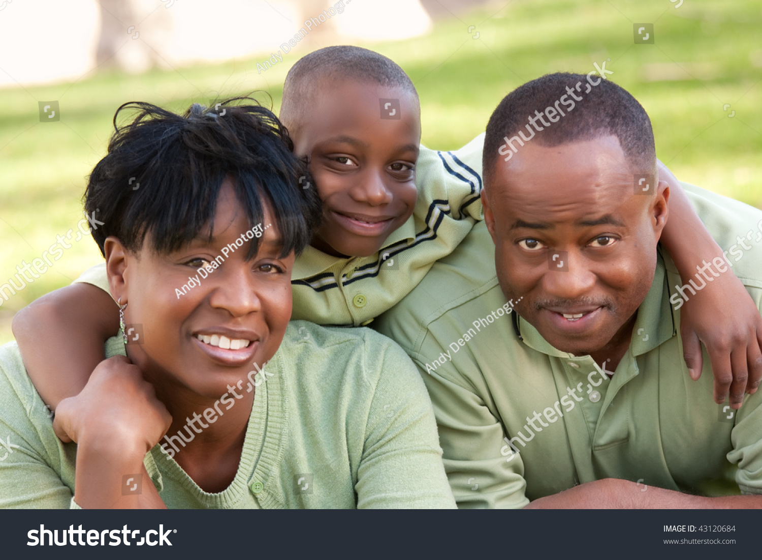 African American Family Enjoying A Day In The Park. Stock Photo ...