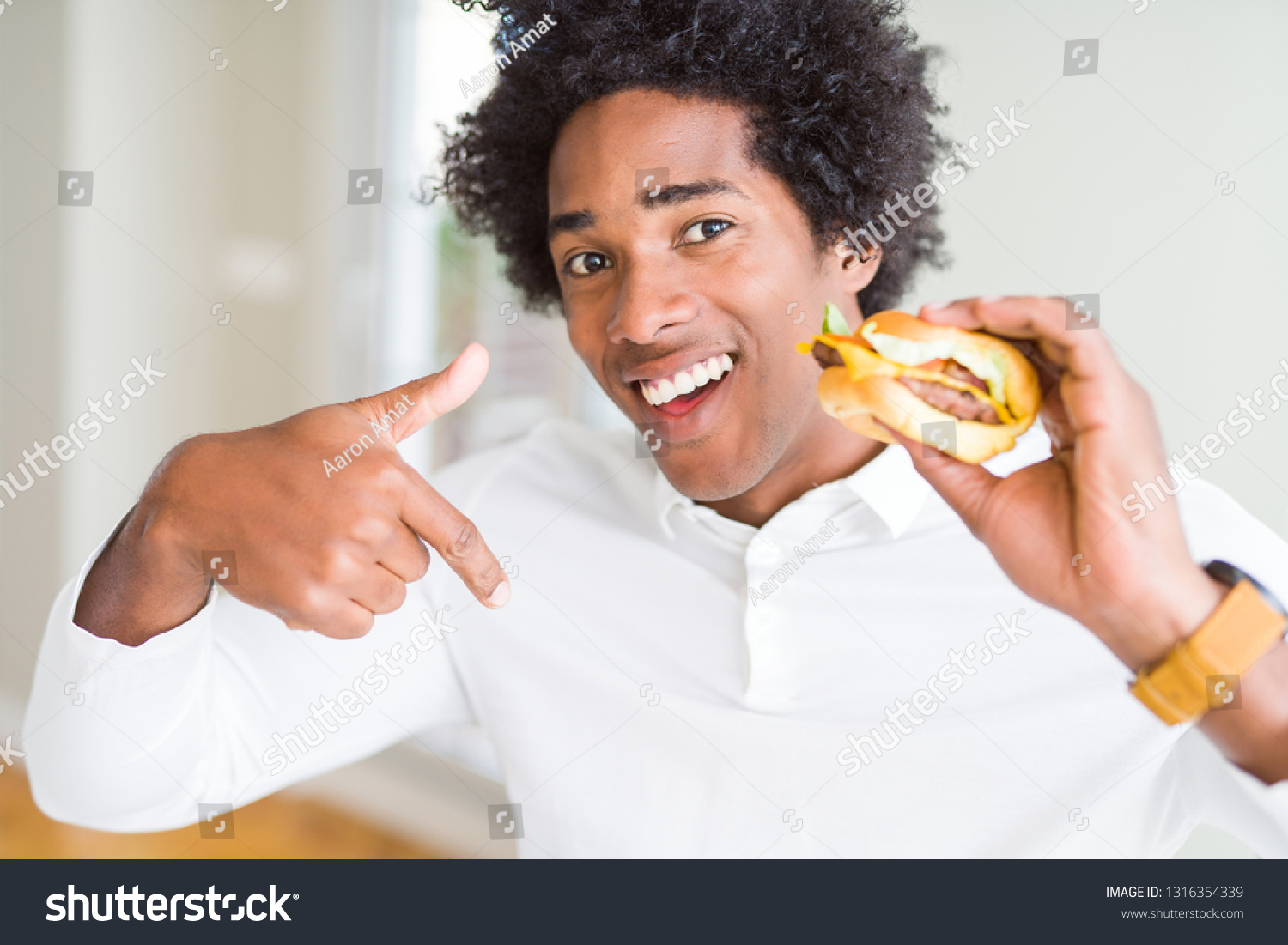 African American Hungry Man Eating Hamburger Stock Photo Edit Now