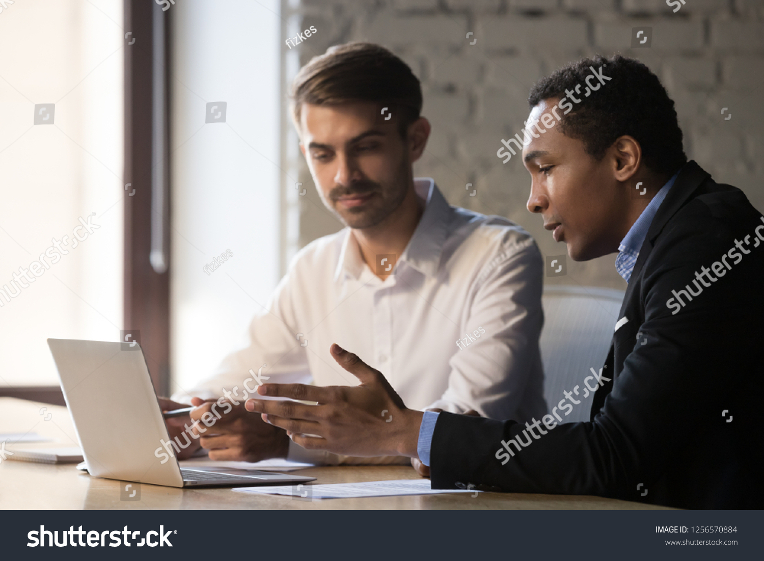 African Manager Consulting Teaching Caucasian Stock Photo (Edit