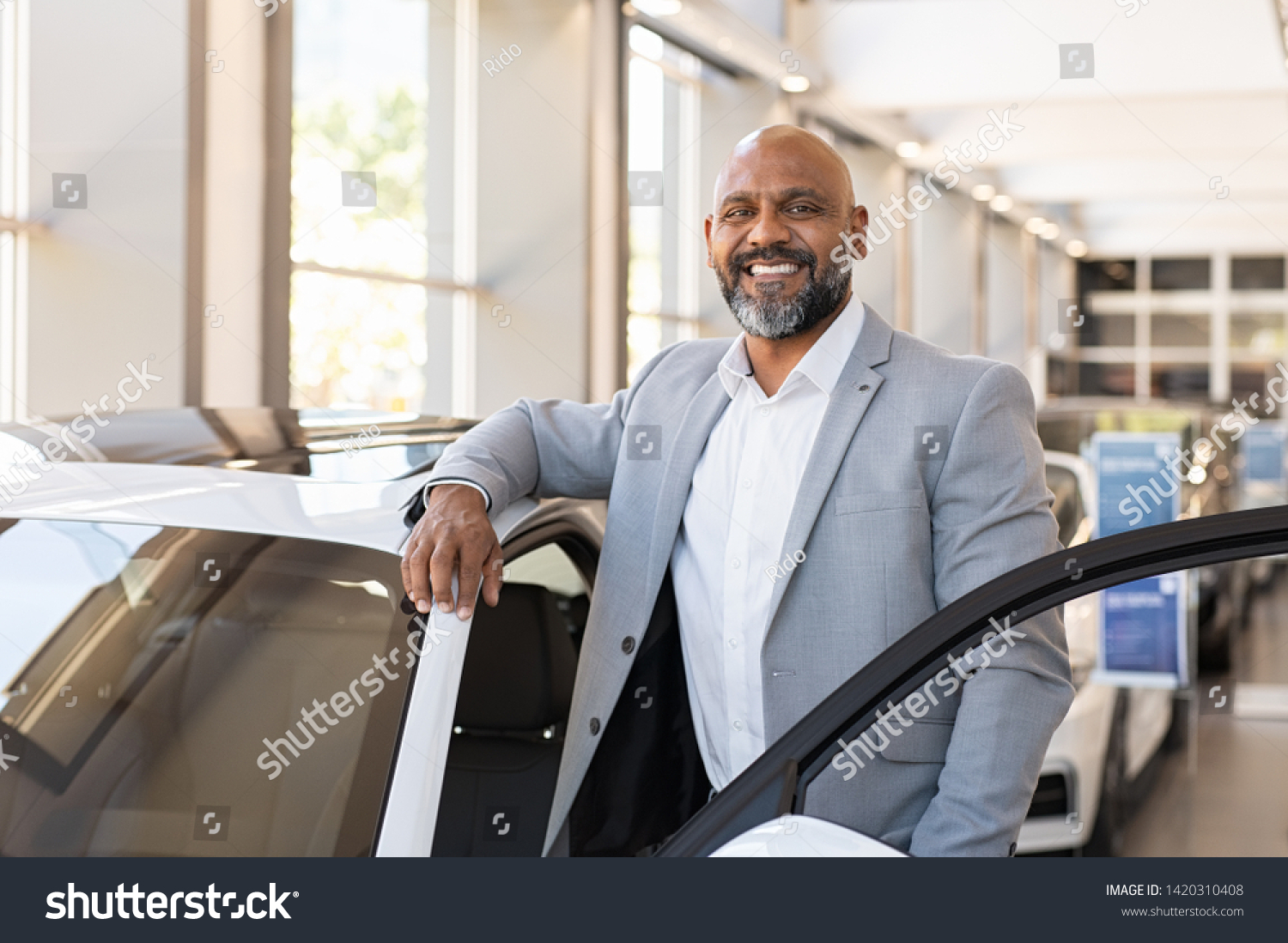 Happy car salesman Images, Stock Photos & Vectors | Shutterstock