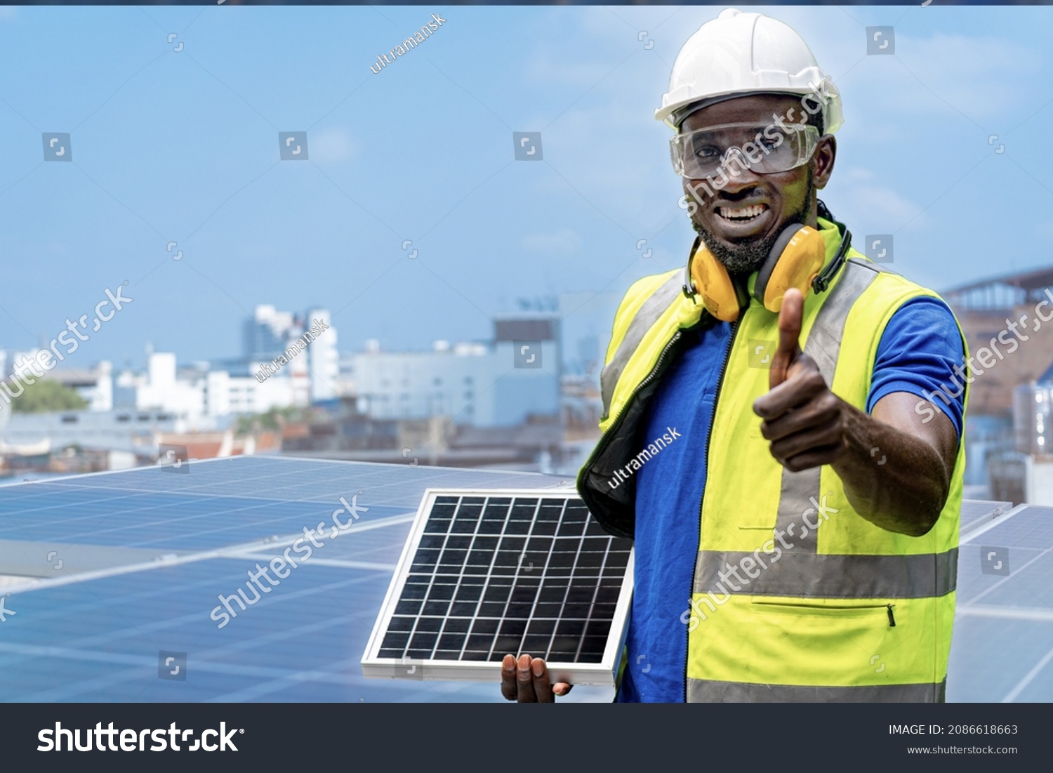 African Worker Holding Solar Cell Panel Stock Photo 2086618663 ...