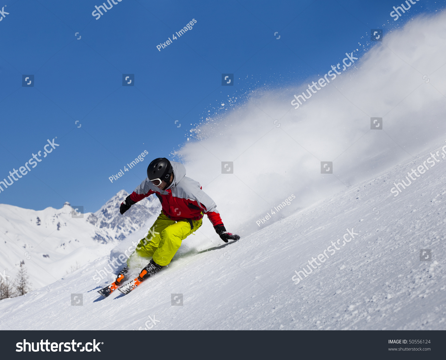Aggressive Skier In The Snow Powder Skiing Fast Stock Photo 50556124 ...