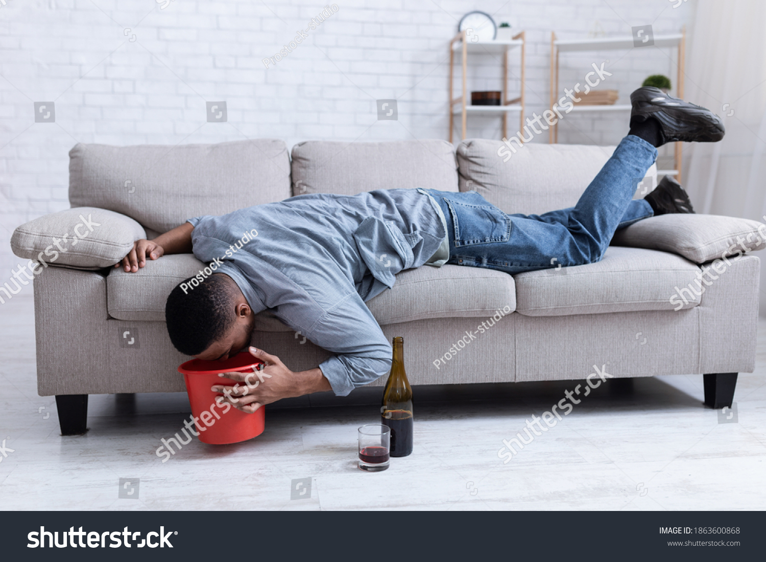 alcohol-poisoning-drunk-man-vomiting-into-stock-photo-edit-now-1863600868