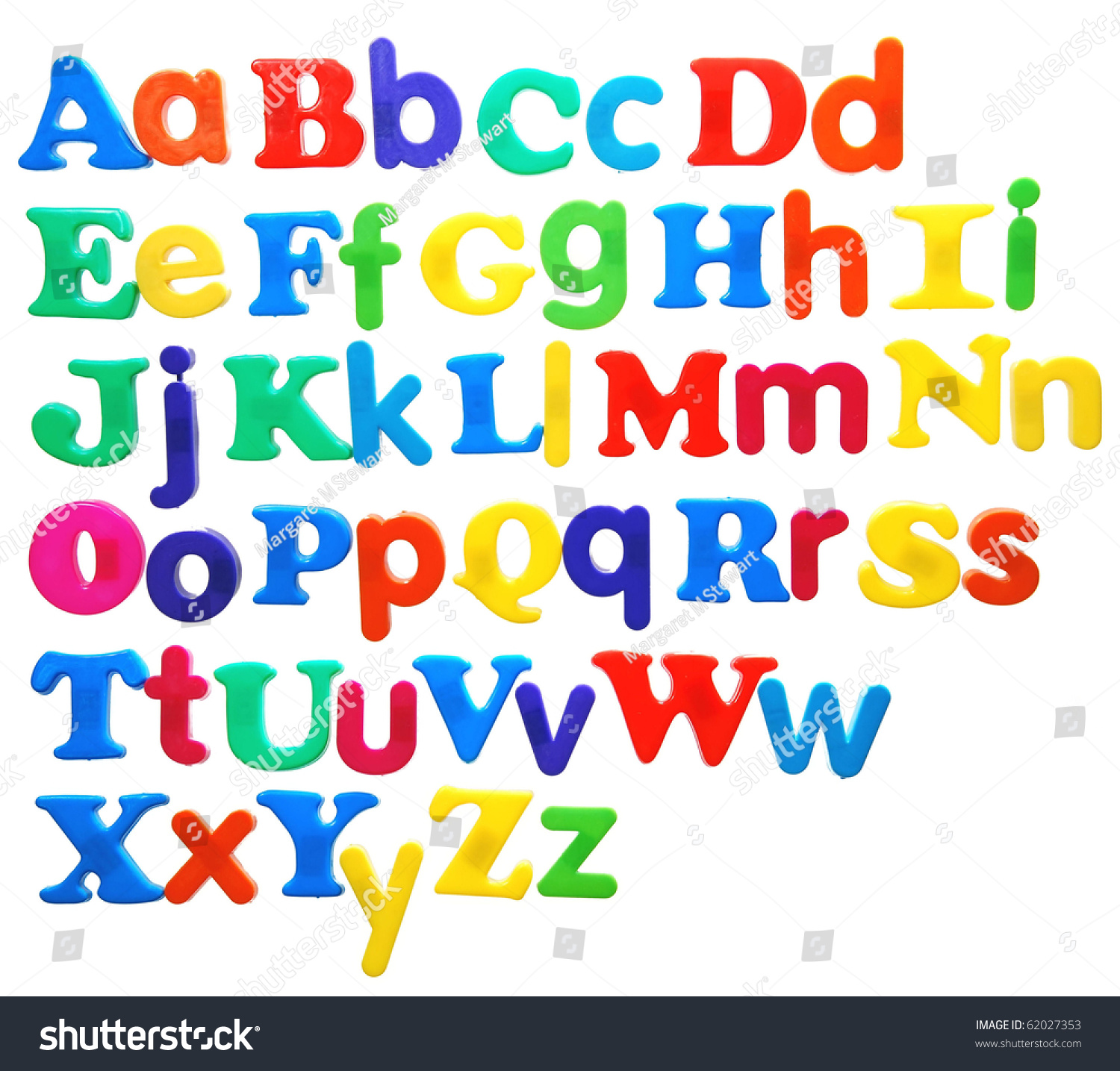 Alphabet Written In Bright Plastic Letters, Featuring Both Uppercase ...