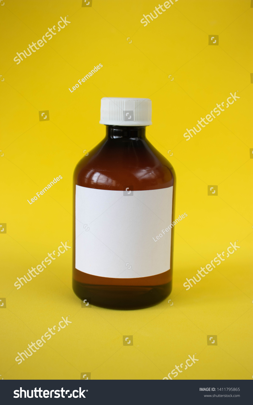 Download Amber Medicine Plastic Bottle On Yellow Stock Photo Edit Now 1411795865 Yellowimages Mockups