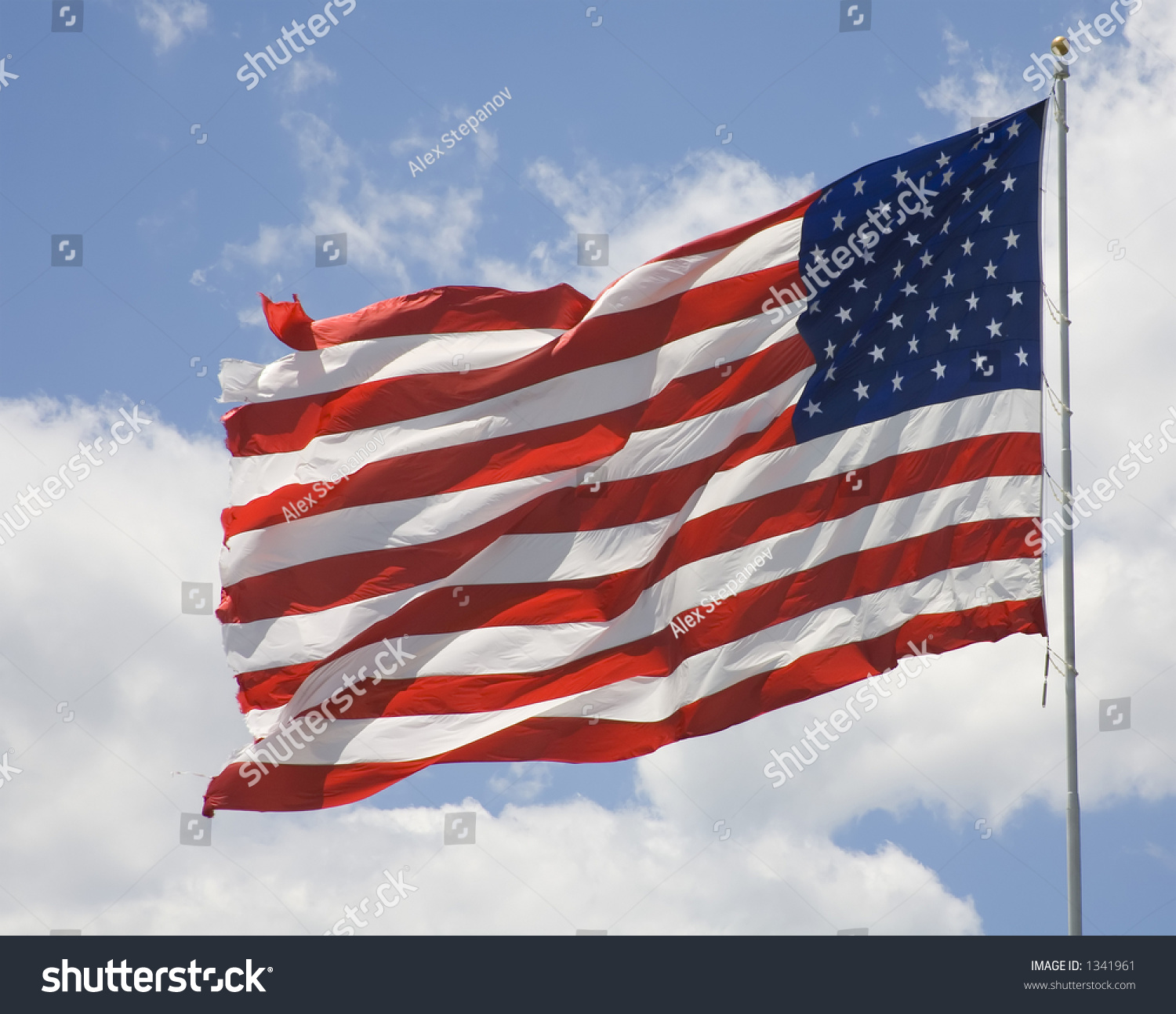 American Flag Flying In The Wind. Stock Photo 1341961 : Shutterstock