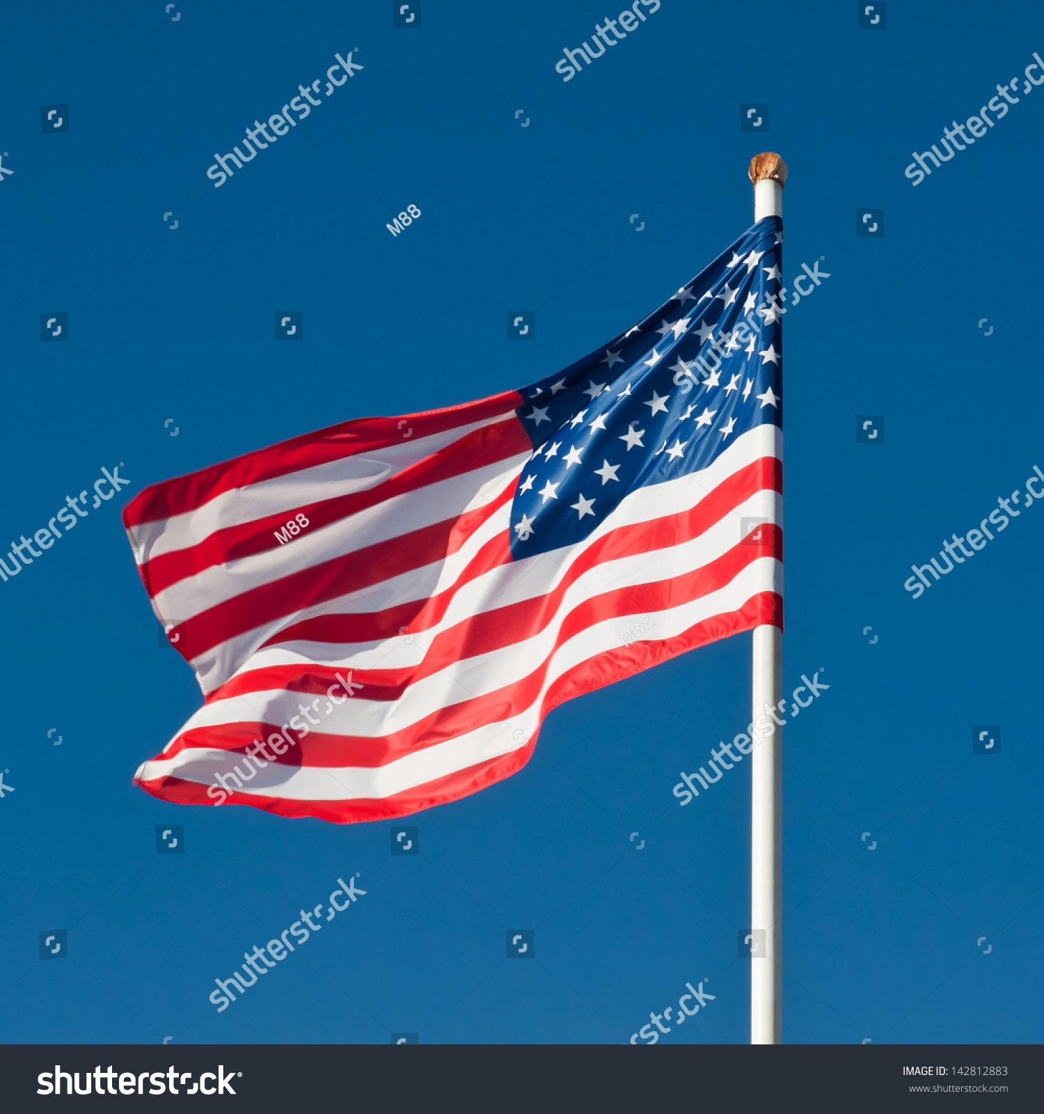 American Flag Flying In The Wind. Stock Photo 142812883 : Shutterstock